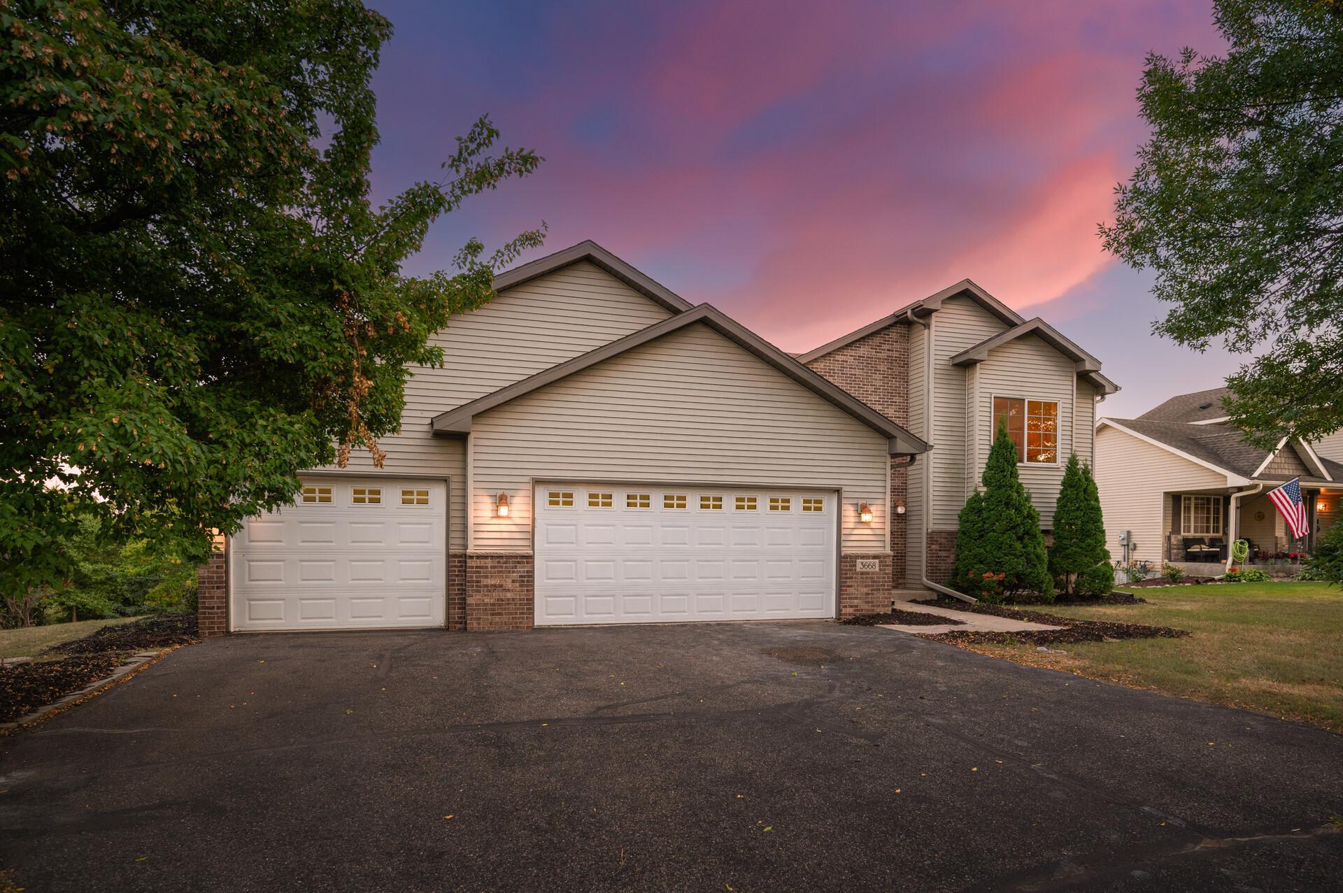 Your search ends here! Step into a bright & sunny, recently renovated multi-level Groveland Neighborhood home w/ an open floorplan & a newly refinished lower level that walks out to a yard overlooking a large, peaceful pond. Step into an open main level flooded w/ natural light through Anderson windows. Cook in a kitchen updated w/granite counters, new appliances, & a coveted center island. Relax in a sunny living room  under a vaulted ceiling w/ new LVP flooring looks out over the pond beyond the backyard ensuring freedom from backyard neighbors. Entertain or unwind in an enormous, newly finished, sun-filled, walkout lower level family room - complete w/ brand new3/4 bath. Lower level bedroom works great as a home office or hobby room. The spacious backyard backs up to a walking path & green space - perfect for evening strolls or letting the kids run free. Just mins from Groveland Park, top-rated Monticello schools, & easy I-94 access. Beautiful remodel at an approachable price. Wow!