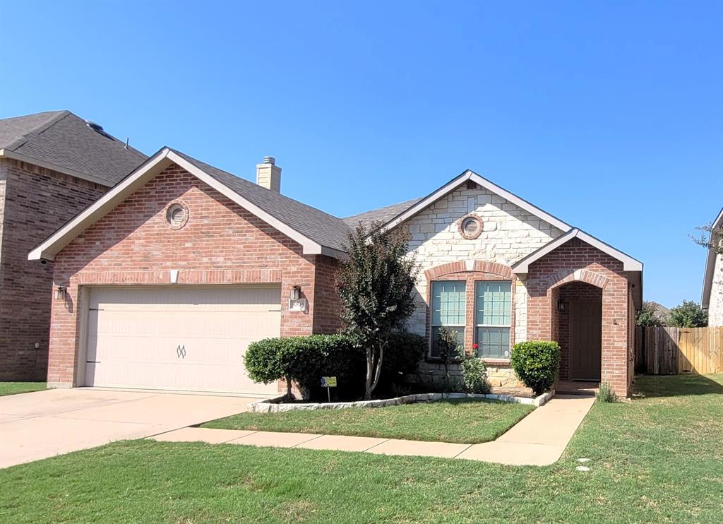 Walking distance to Boswell High School! Great community pool with lazy river and dump bucket. Playground and party area too! Fish in the local pond! Updated roof and HVAC in 2021. Updated paint, sprinkler system, garage door, garage door opener in 2025. Updated wood look flooring in bedrooms in 2022. Interior painted 2024. No carpet, wood look flooring and tile throughout. Ceiling fans throughout. Spacious laundry room with extra shelves plus pantry space too. Open floor plan with corner fireplace. Recessed lighting in living area. Eat in kitchen with nice size breakfast area. Built in microwave, dishwasher, and smooth top stove. Privacy fenced backyard featuring raised garden area. Easy access to restaurants, and recreation at Eagle Mountain Lake. Highly rated Eagle Mountain Saginaw school district!