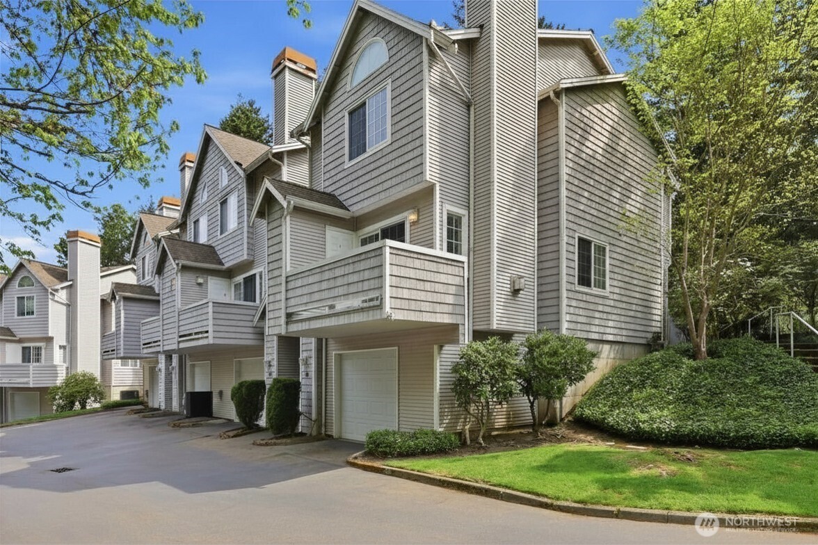 Comfortable indoor-outdoor living meets commuter-friendly convenience in this updated standalone Issaquah townhome. Refreshed kitchen, updated LVP flooring, and thoughtfully designed living spaces create a move-in ready feel with warmth and functionality throughout. Mature trees and established shrubs alongside the home offer added privacy and help keep the home cool during sunny summer days. Vaulted ceilings highlight the spacious primary suite with walk-in closet and private bath, while the ensuite second bedroom provides versatility for guests, work-from-home setup, or additional living needs. Private patio invites outdoor dining and BBQ gatherings, complemented by a balcony with convenient storage closet. Rare tandem 2-car garage with extra storage sits directly below the unit. Conveniently located near I-90, Issaquah Park & Ride, Tibbetts Valley Park, shopping, restaurants, and recreational amenities for easy access to both daily essentials and outdoor activities.