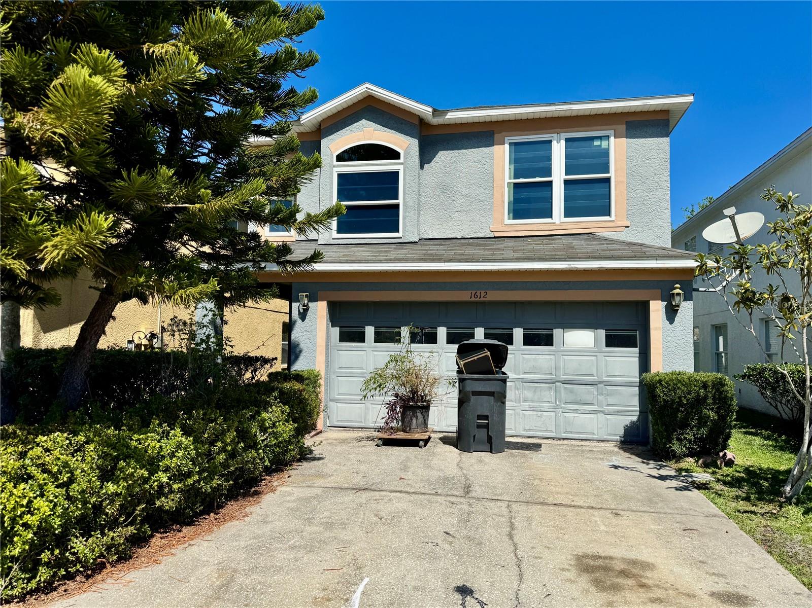 Investor Special! Great opportunity to renovate and add value in a desirable community. This home offers 3 bedrooms, 2.5 bathrooms and is ready for a full rehab. Originally a 4-bedroom home, one of the secondary bedrooms was combined with the primary bedroom to create a large owner’s suite. All bedrooms and two full bathrooms are located upstairs, with a half bath on the first floor for guests.The main level features a living and dining room combination plus a separate family room, providing multiple living spaces. Enjoy the large covered, screened back porch, perfect for relaxing or entertaining. The secondary bedrooms have new impact-resistant windows installed in 2024.Situated on a 0.09-acre lot with a 2-car garage, this property is conveniently located near shopping, restaurants, and easy interstate access. Community amenities include a pool, playground, and basketball courts.  Great potential for investors or buyers looking to renovate and customize.