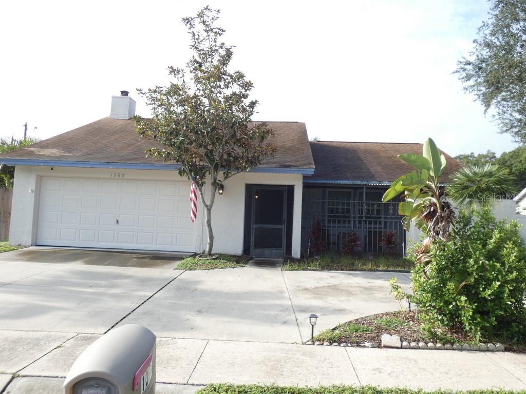 3-bedroom, 2-bathroom non Flood Zone per the County,  Palm Harbor residence ideally situated in a sought-after neighborhood. Featuring a 2-car garage, spacious completed fenced back yard, and thoughtful updates, this home offers a combination of comfort, functionality, and location. Step inside and immediately appreciate the vaulted ceilings, creating an open, bright, and spacious feel throughout the main living areas. The kitchen was beautifully updated in 2025 and features stainless steel appliances, providing a fresh, modern space that's ready for everyday living and entertaining. Outside, the large yard offers plenty of room for outdoor entertaining, gardening, pets, play, or simply enjoying the Florida lifestyle. A screened patio provides an additional comfortable space to relax, unwind, and enjoy the outdoors. 2024 water heater, 2-car garage, and an incredibly affordable HOA fee of just $70 per year. Located in desirable Palm Harbor, this home offers the combination buyers are searching for: an established neighborhood, generous outdoor space, an updated kitchen, vaulted ceilings, and convenient access to the many attractions, beaches, dining, shopping, recreation, and amenities the Tampa Bay area has to offer. Please be sure to view both property videos: Tour 1 & Tour 2 for an even closer look at everything this Palm Harbor home has to offer. Less than 25 minutes to St. Pete Beach In Florida was just named The #1 Beach in America and the Fifth Best Beach in The World. Please view two videos: Tour 1 & Tour 2