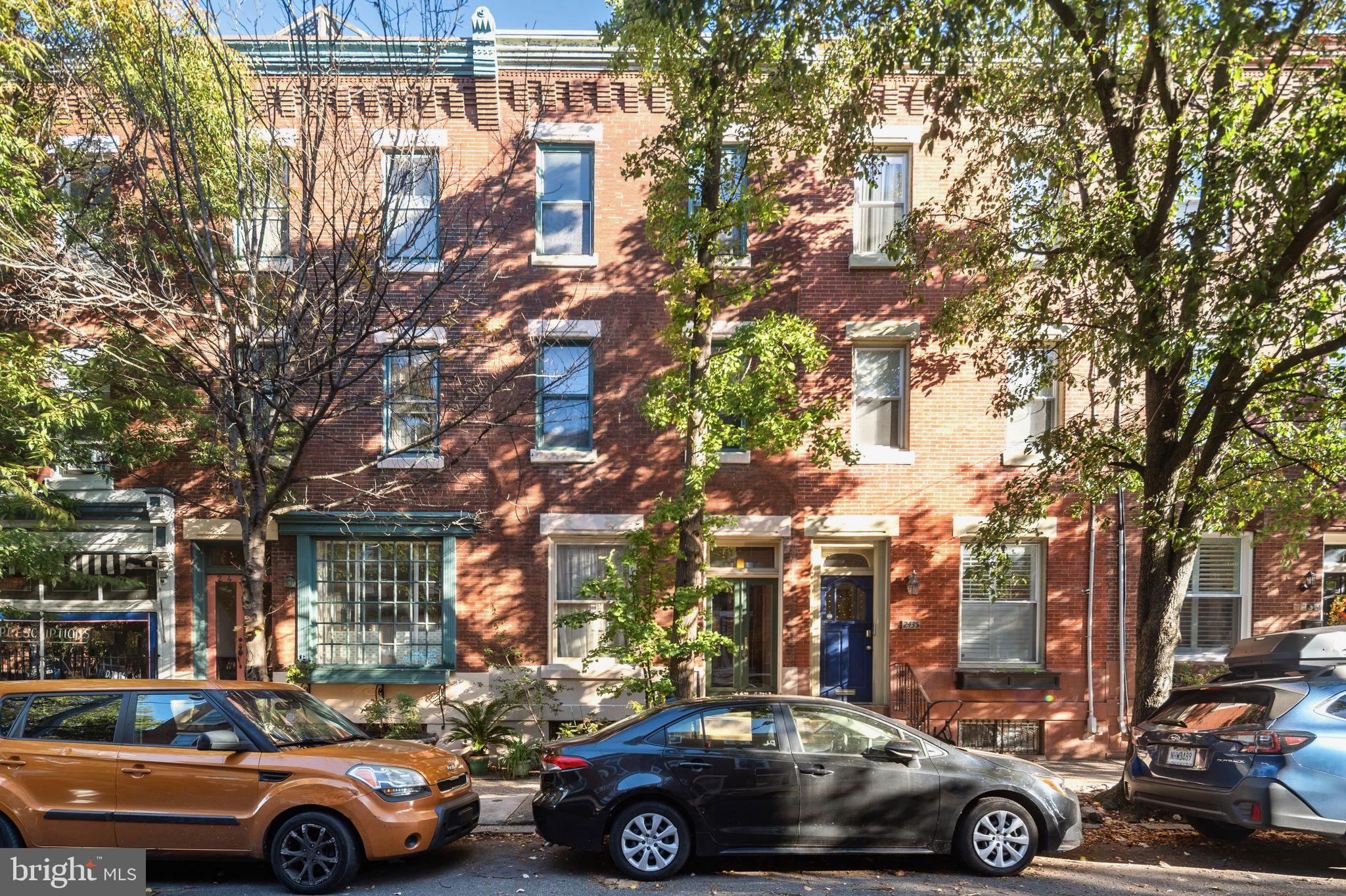 Unique opportunity for a 3-story, 4 bedroom + den, 1.5 bath home in the heart of Fairmount and Bache Martin Catchment. Partially restored and renovated with many original details throughout. Entry foyer with detailed millwork and custom double glass door entrance. Front South-facing living room with wood mantle, Venetian glass chandelier, wood sideboard, large window, high ceilings and crown molding. Stainless steel range and refrigerator. Sunny back room with bamboo floors, powder room and door the back patio. Large, open space awaits the next owner's finishing. Second level features hall bath with heated floors, large walk-in shower, towel warmer and modern vanity. Rear bedroom with French doors to deck and large laundry room. Smaller middle bedroom and large South-facing front bedroom with bamboo floors and large closet. Third level has front bedroom and open den awaiting the next owner's finishing touches. Large well-lit basement with two water heaters for the solar water heating system and gas heated water for radiators. Roof solar panels provide electricity. Great location close to Fairmount Ave, Ellis Pharmacy, Brown Street Cafe, Whole Foods, Target, public transportation, museums, restaurants and all Center City has to offer.