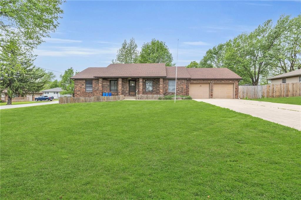Step into this beautiful brick ranch home, perfectly situated on a desirable corner lot. Enjoy outdoor living with a privacy-fenced backyard, complemented by a spacious 20x18 workshop for all your hobbies and projects.

Inside, discover a completely remodeled basement that adds significant living space, ideal for entertainment or relaxation. This home features five bedrooms(2 Nonconforming) and three full bathrooms offering flexible space for a growing family or guests.

The added security of a storm shelter in the basement ensures peace of mind during severe weather. This property combines comfort, style, and functionality in a prime location!