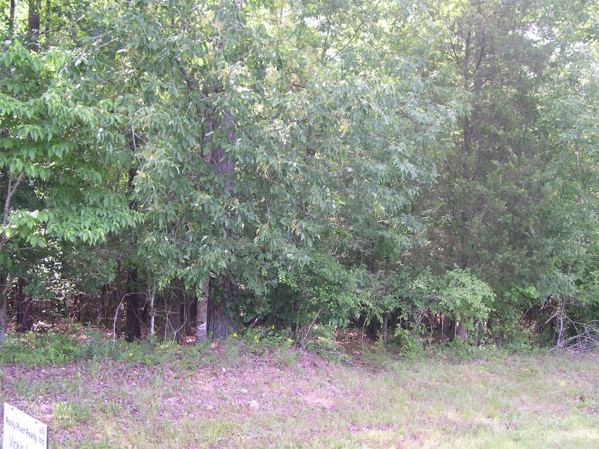 Beautiful country property with running creek   If you want privacy living you have 16.5 acs,  room for RV and boats. Historical indian facts with ton of arrow heads.  20 min to Lake tillery.  Sellers had perk test and perks for 2 bedroom, which I can send the permit to you, and has county water, may perk for more you will just have to pay the county to come back out to access. Survey on file showing the 16.5 acs. Owners will consider owner financing 
depending on terms.