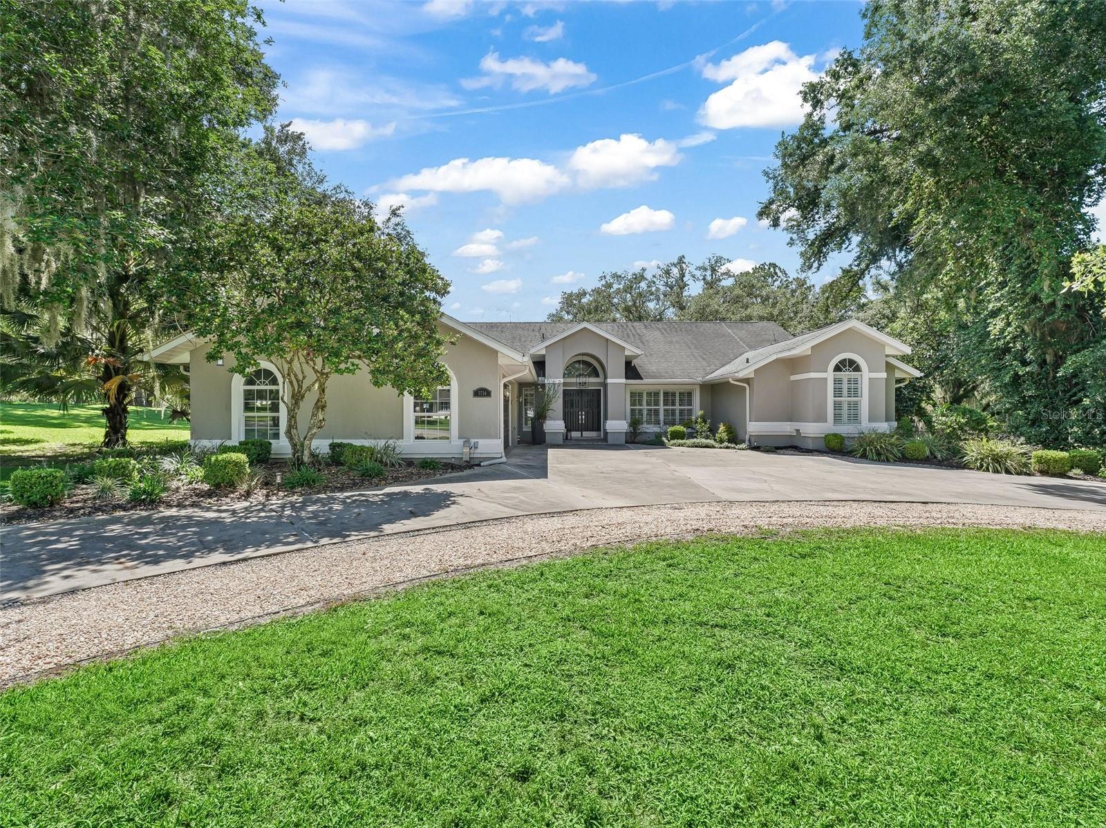 Elegant 3-Bed, 2.5-Bath Pool Home on the 13th Hole in Golden Hills – Minutes from Golden Ocala & WEC. Nestled in the desirable Golden Hills community, this spacious 3-bedroom, 2.5-bathroom pool home offers the perfect blend of comfort and luxury. Situated directly on the 13th hole of the Ocala National Golf Club, enjoy serene golf course views right from your backyard.Inside, the home boasts wood-look ceramic tile throughout—no carpet in sight. The expansive master suite features a cozy sitting area with direct access to the pool, dual walk-in closets, and a luxurious bathroom complete with dual vanities, a soaking tub, and a separate shower.Step outside to your private oasis: an expansive, pavered patio surrounding the sparkling pool, perfect for entertaining. The large, fully fenced backyard offers ample space for pets or play.Location is key—this home is just a 6-minute drive to Golden Ocala Golf & Equestrian Club and only 8 minutes to the World Equestrian Center, placing you at the heart of Ocala’s premier equestrian and golfing destinations.Don’t miss this opportunity to own a piece of paradise in one of Ocala’s most sought-after neighborhoods!