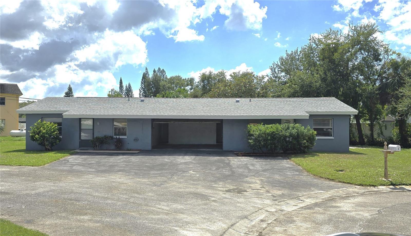 Looking for a smart investment? This 3404 Dahlia Place, Largo, FL duplex could be exactly what you’ve been waiting for. One side has been completely renovated from top to bottom, while the other is partially finished and ready for your personal touch. Both units feature brand-new kitchens with solid wood cabinets, soft-close drawers and doors, granite countertops, new appliances, and sleek tile flooring throughout—no carpet anywhere. Tucked away on a quiet cul-de-sac in Largo, this property offers a golden opportunity for both new and seasoned investors. All the heavy lifting is done, so you can focus on customizing it to fit your vision. You could buy FHA with small down payment and live in one side while renting the other, finish the remaining work and lease it up for long-term income, or complete the updates for a quick flip. For primary occupants a Lease to Own program is available. Either way, it’s versatile property with plenty of options.

Recent upgrades include a new roof and dual HVAC systems installed at the end of 2024. Unit A is fully modernized with a new bathroom, tile floors, light fixtures, baseboards, doors, raised outlets, and hardware. Unit B has its kitchen and flooring completed, offering a solid head start. There’s also a two-car garage that could be reconfigured into two one-car garages, plus a large yard with plenty of green space, a storage shed, and mature landscaping. The city is planning to enclose the drainage ditch along the west side with an underground storm drain—eliminating future flooding concerns and expanding your usable yard space all the way to the fence.
 Located just minutes from Clearwater Beach, St. Pete Beach, and local parks, with quick access to St. Pete–Clearwater International Airport, shopping, and dining, this property is positioned perfectly for strong rental demand year-round.