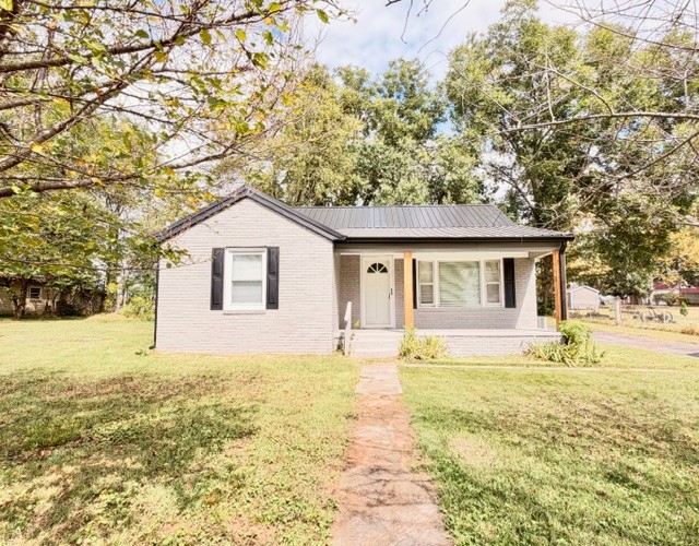 Welcome home to this lovely 2-bedroom, 1-bath home nestles on a nice-sized lot in a quaint small-town setting! Step inside to find beautiful hardwood floors and a large, inviting living area with plenty of room to relax and entertain. The cozy kitchen comes complete with appliances and a convenient pantry, offering great storage and functionality. You'll also love the oversized laundry room, providing extra space for storage and everyday needs. Conveniently located close to Huntland School and local amenities. New fixtures, fresh paint, and so much more.