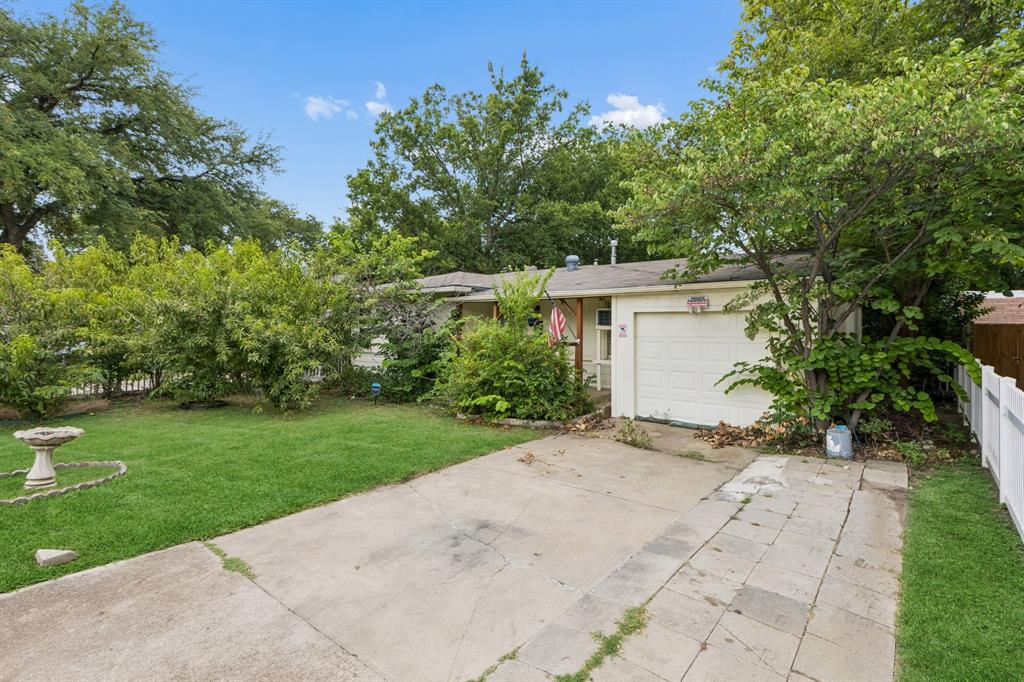 Discover classic character, thoughtful updates, and a convenient southwest Fort Worth location at 4330 Wabash Avenue. Built in 1949, this 3-bedroom, 1-bath home offers 812 square feet of efficiently designed living space near Kellis Park, Foster Park, Interstate 20, Hulen Mall, TCU, shopping, dining, and everyday services. The home blends original details with recent improvements, creating an inviting opportunity for buyers seeking charm, accessibility, and manageable upkeep. Inside, the bedrooms and living room feature newly updated interior paint that gives the home a clean, refreshed appearance. Newly stained original hardwood floors in the bedrooms add warmth, visual appeal, and timeless character. The compact floor plan makes practical use of the available space, while the additional backyard sunroom provides a flexible bonus area that can serve as a sitting room, hobby space, home office, exercise area, or seasonal retreat. Outside, a newly installed white picket fence enhances curb appeal and helps create the classic residential look the seller values. The vinyl gate includes a lock, and a separate vinyl front entry gate provides convenient pedestrian access. The yard includes established trees and room to enjoy outdoor living, gardening, or future landscape improvements. The location is a major advantage for daily travel and recreation. Quick access to Interstate 20 supports convenient commuting throughout Fort Worth and the surrounding area, while Hulen Mall and nearby retail centers place a wide range of shopping, restaurants, entertainment, and services just minutes away. Nearby Kellis Park and Foster Park offer additional green space and outdoor options. With original hardwood flooring, refreshed paint, added sunroom space, updated fencing, and a well-connected location, 4330 Wabash Avenue presents a distinctive opportunity to own a classic Fort Worth home with useful improvements and enduring appeal.