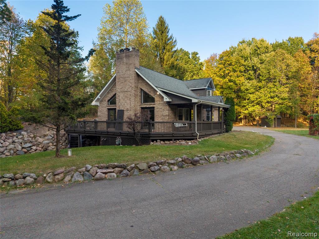 Experience modern luxury and timeless charm in this fully remodeled Cape Cod home, nestled on nearly 7 acres of serene countryside. Behind a private gated entry, this property has been redesigned from top to bottom, featuring all brand-new finishes, fixtures, and mechanicals — truly move-in ready with nothing left to do but enjoy.
Located just 10 miles from downtown Rochester and less than 5 miles from downtown Oxford, the home offers the best of both worlds — peace and privacy with easy access to vibrant suburban amenities, restaurants, and entertainment. Inside, the home boasts a bright open floor plan perfect for entertaining, complemented by a spacious covered front porch and a walkout basement that expands your living space. Every room showcases modern craftsmanship and thoughtful design, from the stunning kitchen and bathrooms to the custom trim and flooring throughout. For those who need space and flexibility, the property includes a 40x60 all-metal barn ideal for storage, hobbies, or workshop use, plus a two-story, three-car garage with a separate entrance that could be transformed into a great room, in-law suite, or home office. Additional highlights include a whole-house generator, a charming “she shed,” and room for chickens, goats, cows, and more — perfect for anyone dreaming of space to roam and live freely.
If you’ve been searching for a completely renovated home that combines modern living with country tranquility, this property is your dream come true.