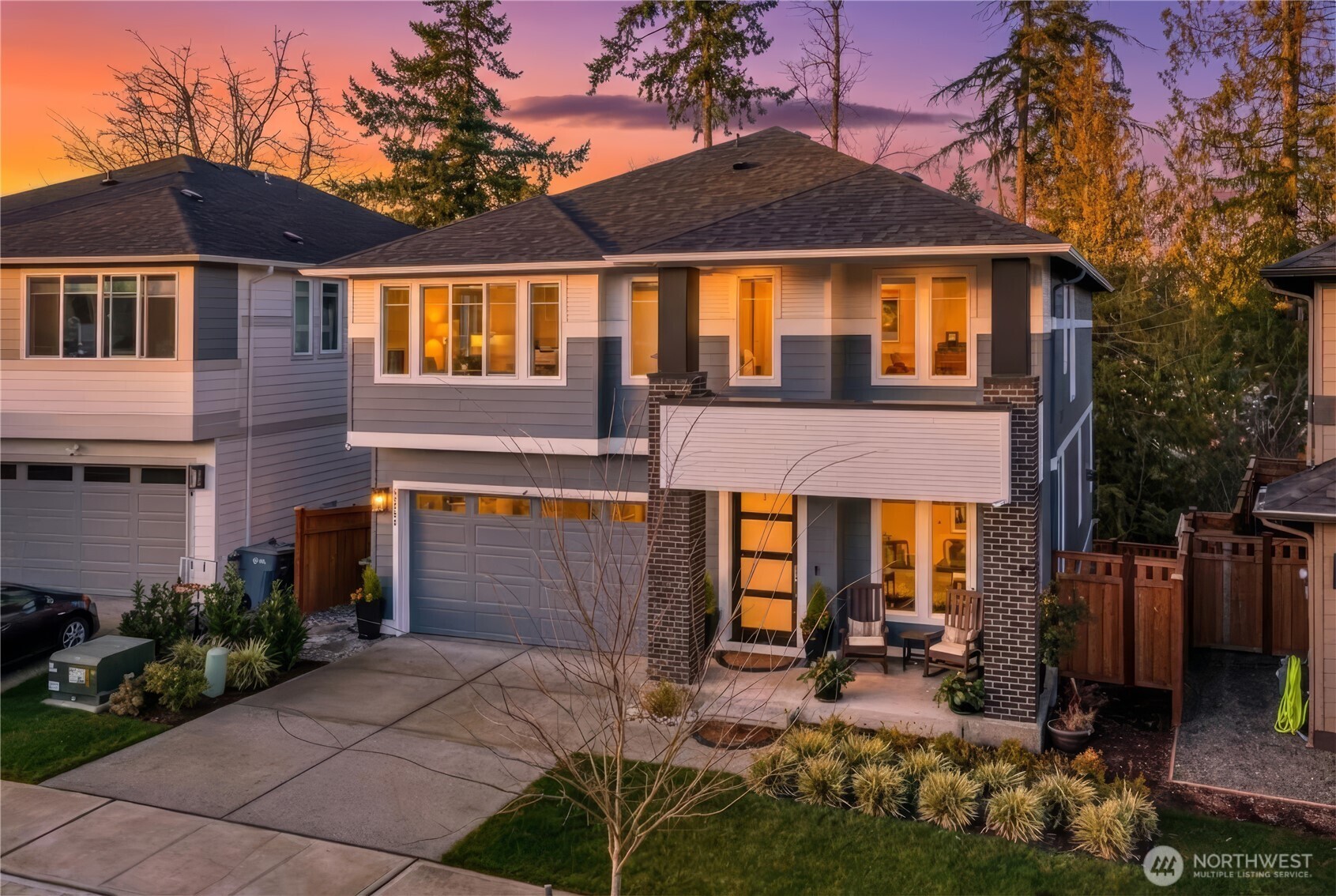 Discover Tehaleh Lifestyle at Eagle Ridge! Backing to private greenbelt w/over $75,000 in builder & custom enhancements! Thoughtfully designed 2-story w/bsmt Trillium floor plan by MainVue is surrounded by trail, pond, greenbelt & breathtaking sunset views. Covered front porch opens to entry & formal dining rm. Custom Graber blinds on all windows! A plethora of natural light from Lg windows in Great rm frame picturesque views. Oversized sliding glass door opens to 1 of 2 covered patios, incl. a main-lvl outdoor living area w/gas fireplace & privacy shade; ideal for year-round enjoyment! A sleek modern kitchen showcases European frameless cabinetry, full-height backsplash, oversized island w/bar seating & premium SS appliances w/5-burner gas cooktop. Extensive kitchen storage w/built-in pantry cabinets. LVP floors flow effortlessly through main lvl & primary suite. Custom SMART int/exterior lighting throughout. Upstairs: bonus rm, utility rm & luxurious primary suite w/custom ELFA walk-in closet & spa-inspired 5-pc ensuite bath: free-standing tub, tile floors, dual vanity, private water closet & frameless step-in shower. 3 add'l bdrms & full bath complete upstairs. Lower lvl offers 1bd/1ba w/walk-in closet, covered patio & spacious rec/media rm plumbed for 2nd kitchen; ideal for multi-gen living & entertaining. Professional landscape: gated access, sprinkler sys, paver pathways, garden beds, accent lighting & low-maintenance turf. Award winning Sumner-Bonney Lake School Dist