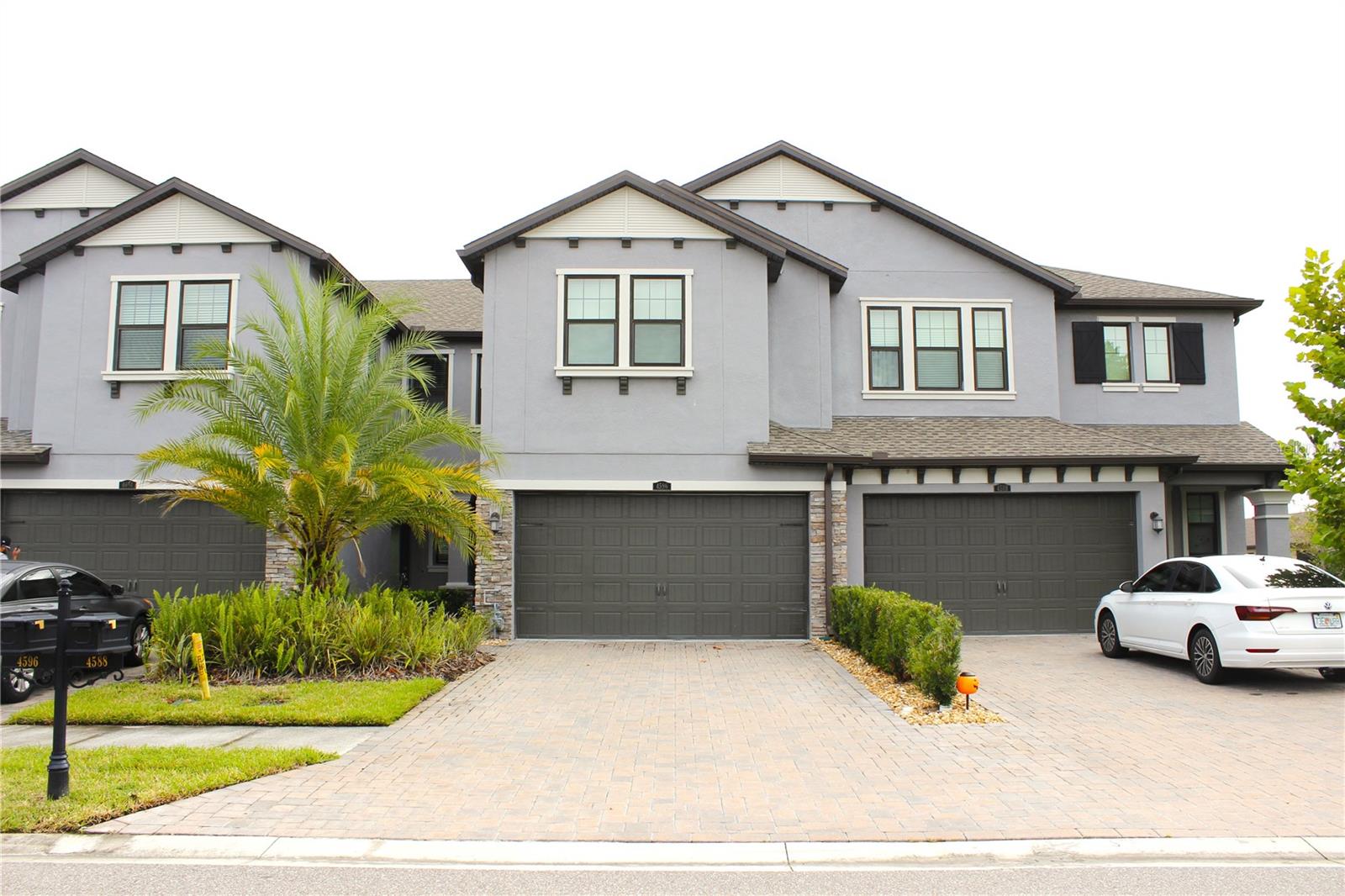 Welcome to your beautifully maintained 2021 townhome in the heart of Estancia at Wiregrass! This 3-bedroom, 2.5-bath home offers 1,827 heated sq ft with an open-concept floor plan, modern kitchen, and a cozy porch perfect for relaxing or entertaining. Upstairs you’ll find a spacious primary suite with walk-in closet, two additional bedrooms, and laundry conveniently located near the bedrooms. The community includes amenities such as clubhouse, fitness center, pool, sidewalks, playground, and gated entry. Easy access to SR-56, I-75, shopping, dining, and top-rated schools. Don’t miss this opportunity!