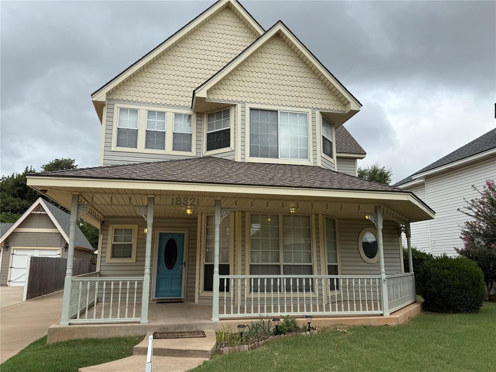Capture the beautiful Victorian charm of this remodeled home in Victorian Place, a quaint little neighborhood of gingerbread homes, less than 2 miles to campus.  The beauty of this one owner home, built on the rich farmland owned by David Boyd himself in times past, starts with the large, covered wrap-around porch and takes you into a modern, freshly updated open floor plan with a cozy gas log fireplace and beautiful new flooring, quartz countertops, and a half bath for guests.  The spacious private master suite is downstairs and includes a jetted tub, two walk-in closets and double vanities in cream and black.  Upstairs are two more bedrooms, a study (or extra bedroom) with built-in bookshelves, and a large storage closet, all with new carpet and fresh paint.  The detached garage is oversized for extra storage and has a fully decked attic.  Come check out this charming home in a very convenient enclave near stores, restaurants & schools!