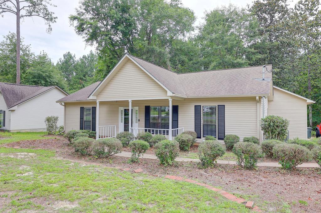 Welcome home to this beautifully maintained 2-bedroom, 2-bath gem offering the perfect blend of comfort, convenience, and easy living! From the moment you step inside, you'll love the bright, open floor plan designed for both everyday living and effortless entertaining. The spacious living area flows seamlessly into the kitchen and dining spaces, creating an inviting atmosphere that feels larger than expected.  The thoughtfully designed layout features comfortable bedrooms, including two primary bedrooms with private baths. Natural light fills the home, adding warmth and charm throughout. The oversized two car garage is located off of the laundry room making entrance into the house a breeze.   Step outside to enjoy the backyard, complete with a detached wired storage building that provides plenty of room for tools, hobbies, seasonal dcor, or additional storage needs. The three tiered deck has spaces for dining, grilling, relaxing and gathering with family and friends.   Whether you're a first-time homebuyer, looking to downsize, or searching for a low-maintenance investment opportunity, this move-in ready home checks all the boxes. Don't miss your chance to own this charming property—schedule your showing today and see why 105 Ayries Drive feels like home!