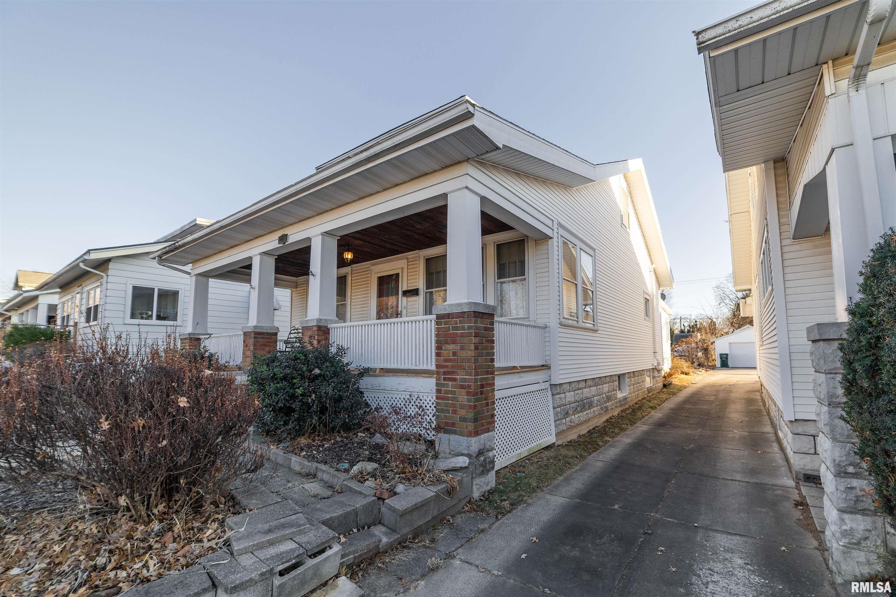 Spacious 4-bedroom, 1.5 bath home offering great living space with a living room plus a large main floor family room featuring a cozy fireplace. The kitchen includes custom hickory cabinets and an island, and the updated HVAC provides comfort and efficiency. Outdoor features include a patio for entertaining, a 1-car garage, and an outbuilding that will convey. The 2nd level offers 3 bedrooms (one with no heat source but will be added prior to close) and a half bath. Radon mitigation system already in place. Plenty of storage throughout with basement space and finished attic storage. A great opportunity with extra room to spread out!