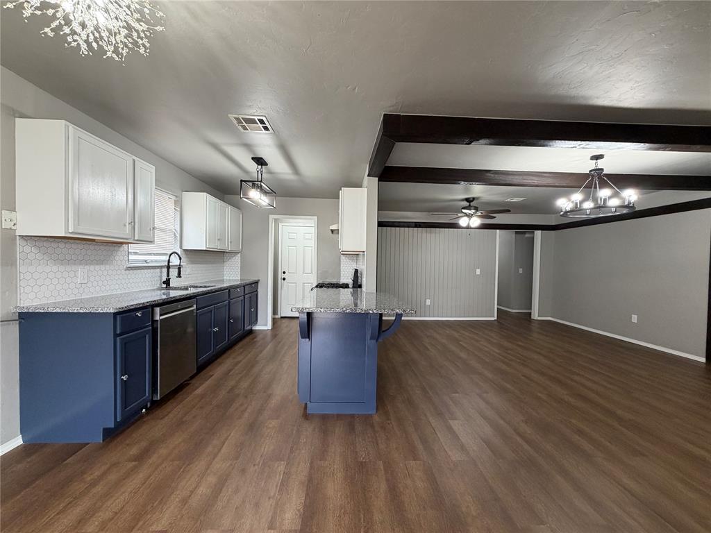 Beautifully updated 3-bedroom, 2-bath home with 2-car garage plus dedicated office in a highly desirable area just minutes from the vibrant NW 23rd Street corridor. This move-in ready property blends modern updates with timeless style.Interior features include remodeled bathrooms, recently painted kitchen cabinets, interior paint and new carpet completed within the last three years. The office/flex room features a stylish barn door, ideal for remote work or additional living space. Functional layout includes interior laundry and convenient side access from the garage — perfect for Oklahoma weather.Enjoy a cozy, fully functional fireplace, updated modern-traditional lighting throughout, and a brand-new 5-burner gas range. The roof is newer, providing added value and peace of mind. The garage includes two separate openers, one for each door.Outdoor living offers a covered patio and private backyard with pool, creating excellent potential for entertaining and seasonal enjoyment.Located near shopping, dining, and major amenities along NW 23rd, and positioned in a highly sought-after school area. With strong rental and long-term value potential, this home offers both lifestyle and investment appeal.Schedule your private showing today.