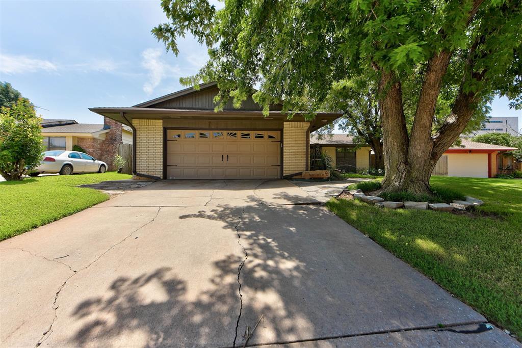 Welcome to Windsor Lakes! Nestled in the quaintest cul-de-sac, just seconds away from all things Lake Hefner! This charming home sits on a sizable 0.33 acre lot with the lushest lawn! With 4 bedrooms, 2 full bathrooms, formal and kitchen dining, an expansive living area with cathedral ceilings + cedar beams + gas fire place... and the most beautifully updated kitchen for all of your cooking desires. Built-in gas cooktop, an abundance of cabinetry, stylish tile backsplash, vent hood, and plenty of counter space for entertaining! And this backyard... you're going to have to see it to believe it. In addition to the massive lot, the open back patio with hot tub spa has plenty of room for a fire pit to gather around this fall. Newer carpet and flooring throughout! Just minutes from shopping, dining and entertainment at OAK OKC + Penn Square Mall! Please join us this Sunday, 9/21 from 2-4pm for an Open House!