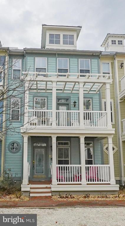 Welcome to 35 Seaside, a spacious coastal retreat located inside the gated, amenity-rich community of Sunset Island in Ocean City. Designed for effortless beach living, this multi-level townhome offers the perfect blend of space, comfort, and resort lifestyle — ideal as a primary residence, second home, or high-demand vacation rental.Featuring 4 generously sized bedrooms, 4.5 bathrooms, and over 2,300 square feet of living space, this home comfortably accommodates large families and guests. The open-concept main living area is filled with natural light and flows seamlessly onto multiple outdoor spaces — perfect for entertaining or unwinding after a day at the beach.Enjoy the convenience of a 2-car garage plus additional parking, an outdoor shower, and multiple balconies and porches that invite coastal breezes. The flexible layout allows for additional sleeping or bonus space, making it especially attractive for rental income potential.As a Sunset Island owner, you’ll enjoy resort-style amenities including indoor and outdoor pools, a clubhouse, fitness center, private bayfront beaches, walking and jogging paths, a crabbing pier, café, and 24-hour gated security — all just minutes from the Atlantic Ocean, dining, and entertainment.Whether you’re looking for a private island escape or a smart coastal investment, 35 Seaside delivers space, lifestyle, and value in one of Ocean City’s most desirable communities.