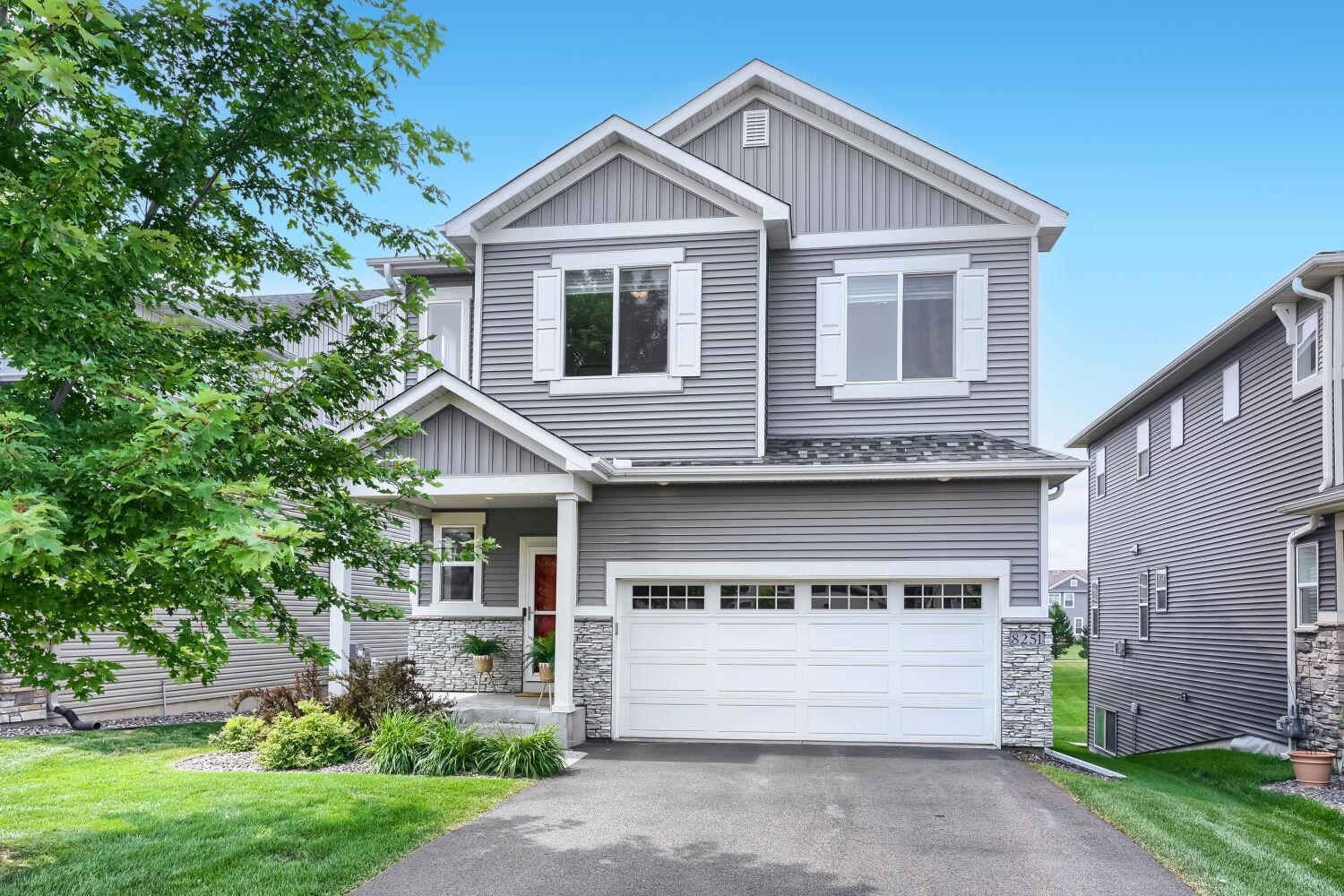 Beautifully maintained newer construction in the highly desirable Lakeview at Central Park neighborhood of Maple Grove (No HOA)! This light-filled two-story home features an open floor plan designed for today's lifestyle. The spacious kitchen features quality cabinetry, abundant workspace, and flows seamlessly into the dining area and and living room with a cozy gas fireplace—ideal for everyday living and entertaining. Upstairs, you'll find four bedrooms on one level, including a spacious owner's suite with a private bath and walk-in closet. A large upper-level laundry room adds everyday convenience exactly where you need it most. The finished lower level provides exceptional additional living space with a spacious family room, recreation area, full bath, additional storage space, and large daylight windows that fill the space with natural light, making it perfect for entertaining, movie nights, hobbies, a play area, or overnight guests. One of the home's standout features is its desirable lot with no direct homes behind, offering peaceful views of the neighborhood pond and park. The home also features smart technology for added convenience, including a remote-controlled garage door, smart video doorbell, and other connected home features. A quality home water filtration system provides an added level of comfort and peace of mind. Ideally located just a short jaunt to Central Park, all the shopping, dining and activities of The Shoppes at Arbor Lakes, Elm Creek Park Reserve, miles of walking and biking trails, Weaver Lake, and more. Enjoy convenient access to I-94, Highway 610, and Highway 169, all within the highly regarded Osseo Area School District. Blending the benefits of newer construction, modern comfort, everyday convenience, and a vibrant neighborhood setting, this exceptional home is ready to welcome its next owners!
