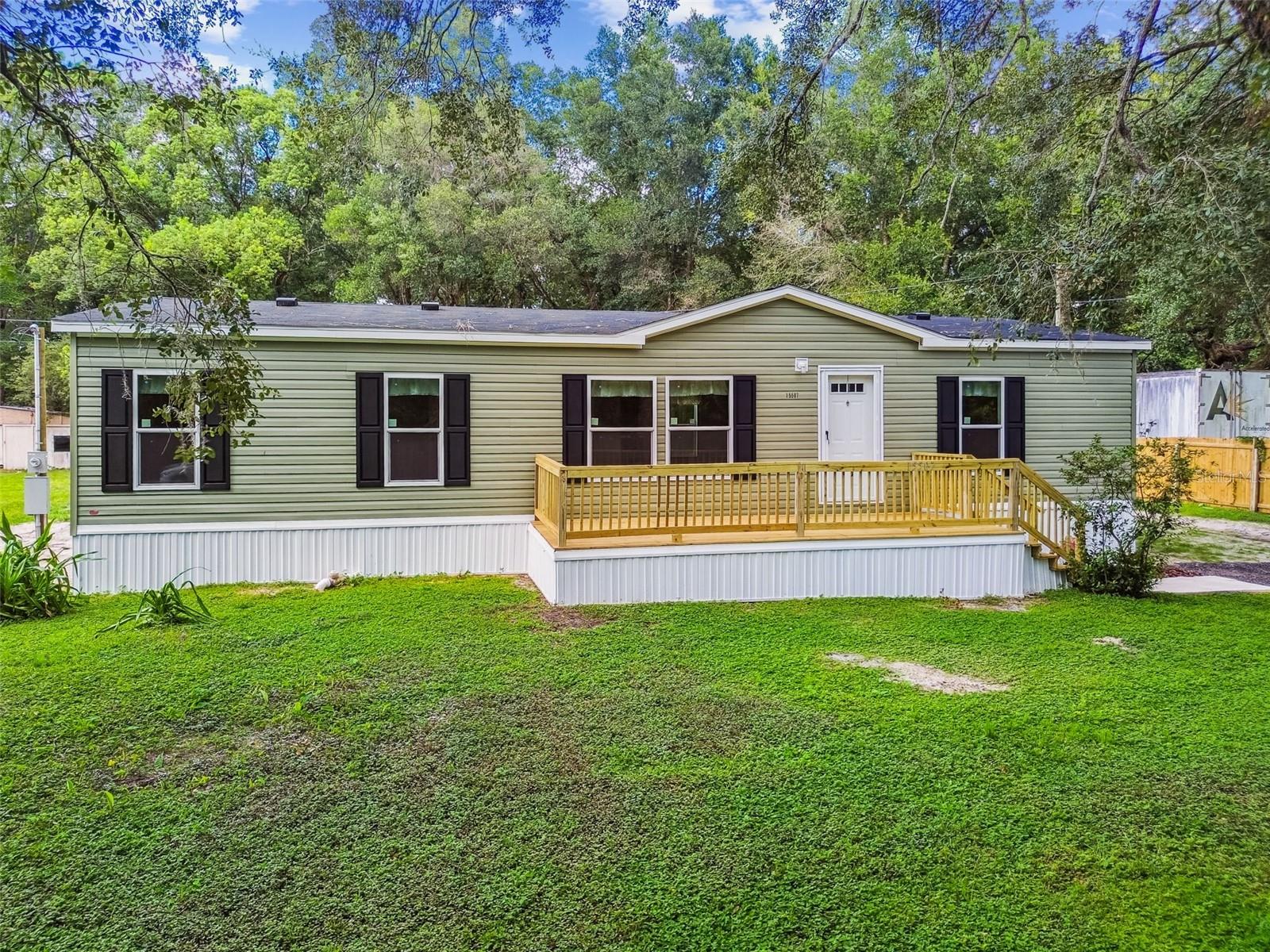 Beautiful & Brand New!

This stunning 3 bedroom, 2 bathroom manufactured home sits on just over half an acre in the peaceful Masaryktown community of Brooksville. Featuring an open concept split-bedroom floor plan, this home was designed with efficiency, comfort, and privacy in mind.

Inside, you’ll find wide plank laminate flooring throughout—both durable and easy to maintain. The bright, open kitchen is perfect for entertaining and includes oak brown cabinetry, brand-new energy-efficient appliances, and a window over the sink with a view of the backyard. All bedrooms are generously sized and feature large walk-in closets for ample storage.

Step out the rear door to a wooden deck and patio, the perfect space for grilling and enjoying your private backyard. The expansive front entry deck adds another inviting outdoor living area.

Everything here is brand new—from the AC unit and appliances to the well pump and the home itself—giving you peace of mind for years to come.

The property also showcases beautiful Grandfather Oaks and is tucked away on a quiet street. With no HOA, you’re free to bring your boat, camper, or trailer, and there’s plenty of room to add a workshop or detached garage.

Conveniently located just 5 minutes from the Veterans Expressway for an easy commute to Tampa and the airport, and less than 10 minutes from Historic Downtown Brooksville, this home combines modern living with country charm.

Don’t miss out—schedule your private showing today!