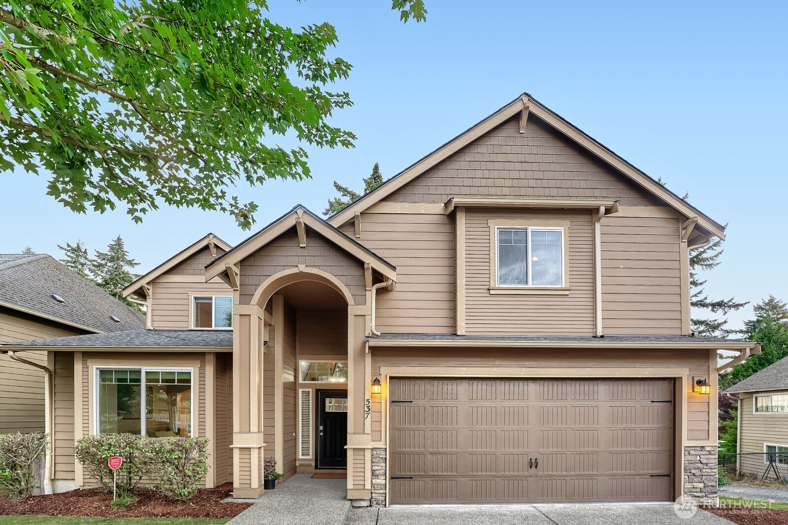Smart value meets serious space in Renton's sweet spot. Tucked just east of I-405 off NE 4th, this 2014 build 2,720 sq ft  4-beds layout checks your every box.  Main level is designed for real life: formal dining and living up front with crisp white millwork, leading back into a wide-open family room anchored by a stone-accent gas fireplace. Solid kitchen setup features slab granite, stainless steel appliances, tile finishes, and plenty of pantry storage.  Slider off the kitchen opens straight out to an oversized, sun-drenched west-facing deck. It catches bright afternoon light through sunset—perfect for summer grilling and low-maintenance outdoor downtime without giving up your weekends to yard work. Upstairs, the private primary suite complete with a 5-piece bath and walk-in closet,  two generous secondary bedrooms and a flexible bonus room ready for dual WFH setups or family movie nights or a gym.  Commuter’s dream: skip the surface-street crawl and hit 405 in two minutes flat to Bellevue, Renton Boeing, Sea-Tac, or downtown Seattle. Minutes to Target, dining, and movies at The Landing, strolls at Coulon Park on Lake Washington, plus easy access to Renton’s popular STEM option school (Sartori Elementary). Rare square-footage value in a commuter-central location—move-in ready and easy to show!
