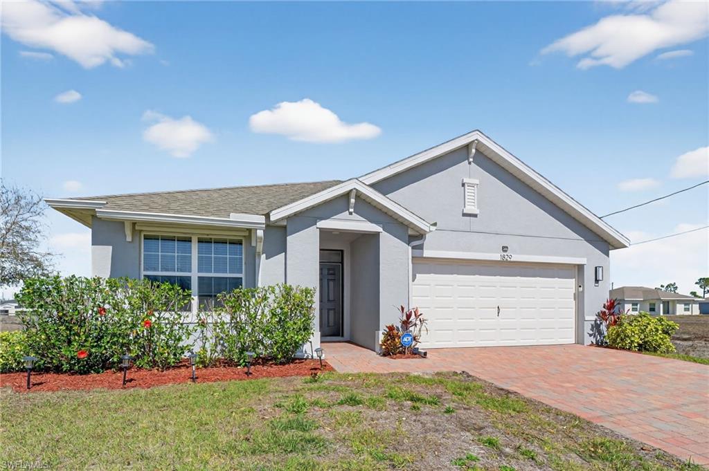 One or more photo(s) has been virtually staged, AI generated or rendered.  Move-in ready and better than new! Why wait months for new construction when you can move right in? This beautifully maintained 2023 DR Horton Aria offers 3 bedrooms, 2 bathrooms, and a bright, open-concept floor plan designed for comfortable Florida living. Enjoy the benefits of solar panels installed for lower electric bills, private well water with no monthly water bill, and no HOA fees. The spacious kitchen features a large center island, walk-in pantry, and stainless steel appliances, while the split-bedroom layout provides added privacy. Relax or entertain on the screened lanai overlooking the oversized backyard. Situated on a generously sized lot with plenty of room to build your dream pool, this home also offers added privacy with only one immediate next-door neighbor, as the adjacent lot is currently vacant. Skip the uncertainty, delays, and extra expenses of buying new—the builder warranty items and punch-list repairs have already been completed, giving you the peace of mind of a nearly new home without the hassle. Freshly painted and truly move-in ready, all that’s left to do is unpack and start enjoying your new home.One or more photo(s) have been virtually staged, AI-generated, or rendered.