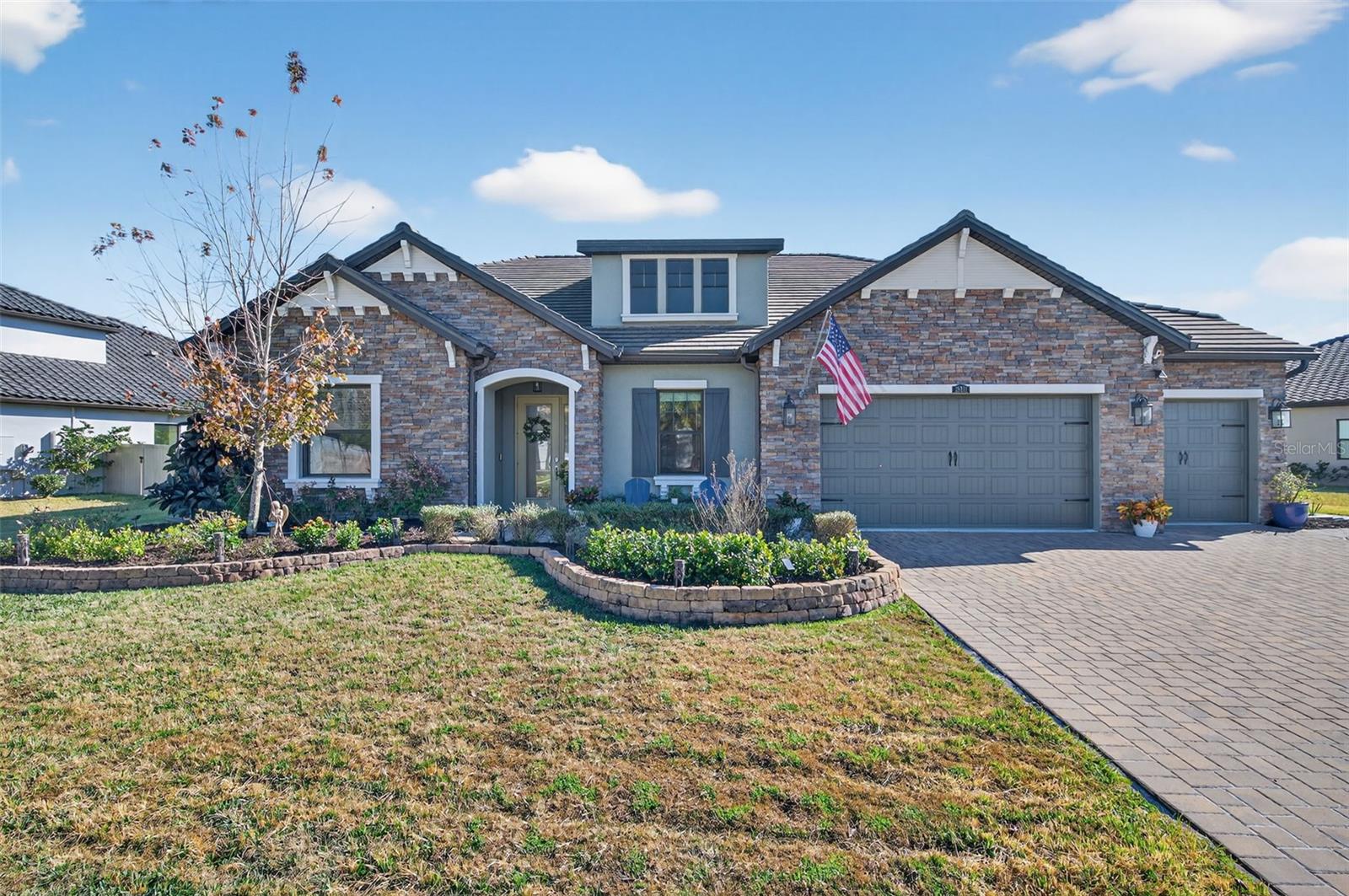 The Wesley Chapel home that checks all your boxes is officially here- Welcome to 28501 Picana Lane, an exceptional single-story luxury residence where thoughtful design, elevated upgrades, and resort-style living come together in this perfect turnkey home! Situated on a .31-acre premium pond homesite with breathtaking sunset views, this home has it all!As you approach the home, you’re immediately welcomed by an upgraded stone elevation, framed by meticulously designed, high-end landscaping that wraps the property from every angle. The curb appeal is both grand and inviting, setting the tone for the craftsmanship and attention to detail found throughout the home.Step inside and experience the elegance of the Avila floorplan by WCI, built in 2020 and offering 3,030 square feet of beautifully curated living space. This thoughtfully designed layout features four generously sized bedrooms, a private den, and a flex room, providing exceptional versatility for today’s lifestyle. Whether used as a home office, media room, or additional living space, each room flows seamlessly while maintaining its own sense of purpose. High ceilings, expansive living areas, and abundant natural light create a warm yet sophisticated atmosphere throughout, complemented by a three-car garage that adds both functionality and convenience.As you move through the heart of the home, designer details and custom upgrades take center stage. A built-in coffee bar with floating wood shelves offers a stylish and inviting space to begin your mornings, while the custom-built bar complete with a kegerator transforms the home into an entertainer’s dream. The living room is anchored by a striking electric fireplace insert, thoughtfully designed as a unique showpiece that elevates the grand living space. These carefully curated features distinguish the home beyond standard finishes, blending luxury with everyday comfort.Step through the sliding doors and into your own private, fully screened lanai, where indoor-outdoor living reaches a new level. The backyard showcases a freeform saltwater pool and spa, complete with a gas heater for year-round enjoyment. An outdoor kitchen completes the space, making it ideal for hosting gatherings, while a backyard golf putting green adds a rare and distinctive luxury feature. Overlooking the tranquil pond, this outdoor oasis offers serene water views and unforgettable sunset backdrops, creating a true resort-style retreat right at home.Beyond the residence itself, the home is located within Matera, a gated enclave inside the prestigious Estancia at Wiregrass Ranch, offering enhanced privacy with a secondary private resident gate and access to one of Wesley Chapel’s most sought-after master-planned communities.Living in Estancia at Wiregrass Ranch means being part of a vibrant resort-style community with world-class amenities including lushly landscaped parks, scenic walking trails, and a resort-style clubhouse and pool—perfect for relaxation and recreation. Conveniently located near The Shops at Wiregrass, AdventHealth Wesley Chapel, I-75, and top-rated schools, this location offers an unmatched combination of elegance and accessibility. Don’t miss this rare opportunity to own a turnkey home in one of Wesley Chapel’s most desirable gated communities. Schedule your private showing today and experience what its like to be an Estancia resident! **ASK ABOUT OUR PREFERRED LENDER INCENTIVES & OUR OTHER PROMOS!**