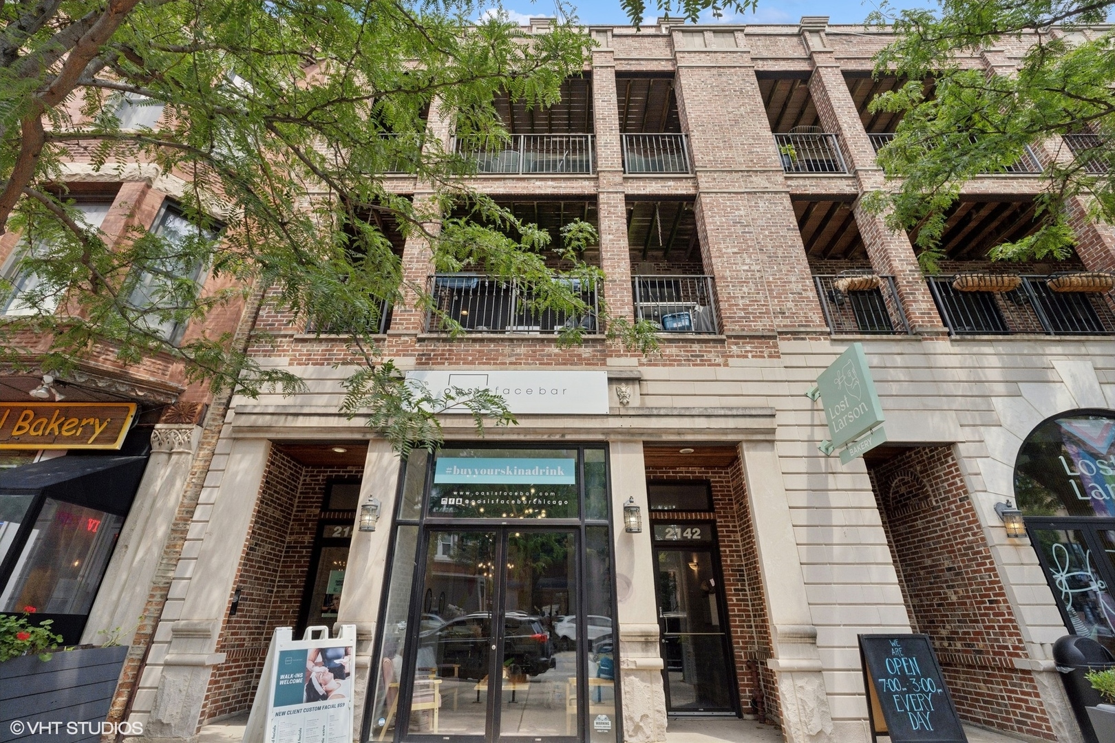 Beautifully renovated and bathed in natural light, this 3-bedroom, 2-bathroom condo is situated on trendy Division Street in Wicker Park. The open-concept layout seamlessly flows from the updated kitchen-boasting a generous breakfast bar, pristine quartz countertops, new appliances, and shaker cabinetry-into the expansive living room, complete with a designated dining area. Elegant touches abound, including a cozy fireplace, re-stained hardwood floors throughout, freshly painted walls, and an abundance of windows that flood the space with light. Double doors open to a spacious front deck, ideal for entertaining and outdoor living. A well-appointed hallway with ample storage closets provides a thoughtful separation between the common areas and private sleeping quarters. The second full bath is newly updated and includes a tub, while bedrooms two and three overlook the second private deck. At the rear of the condo, the serene primary suite features two closets with custom systems and an ensuite bath, complete with a double vanity, walk-in shower, and a steam feature for ultimate relaxation. In-unit laundry, private storage unit, shared rooftop deck, outdoor parking, and a new secure entry system on both the building and the unit complete the suite of conveniences. Kitchen 2021, AC 2023, water heater 2024, furnace 2019, floors 2024, paint 2025. Live on a quieter part of Division yet walk to Wicker's hottest restaurants, bars, and cafes. Or simply step outside your front door for fresh sandwiches and coffee options galore! Easy access to I-90 and the Blue Line, which you can take straight to O'Hare Airport. This location can't be beat - nothing to do but move in and enjoy!