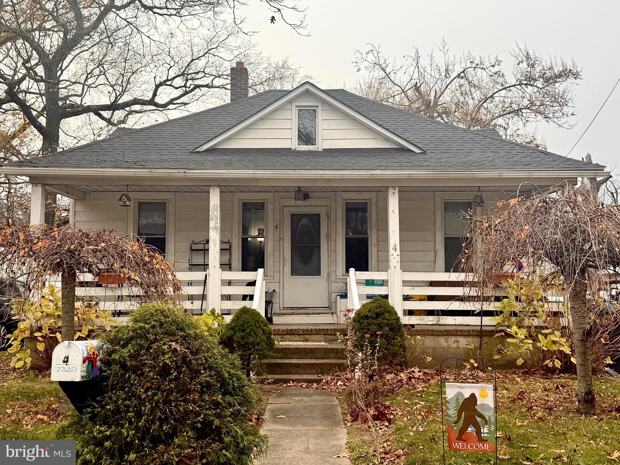 This charming 1950s bungalow in the Oakdale community offers a perfect blend of comfort and functionality. With four spacious bedrooms and two full bathrooms, the traditional floor plan features a cozy combination dining and living area, ideal for gatherings. Recessed lighting and ceiling fans enhance the ambiance, while the combination of laminate plank and partially carpeted flooring adds a touch of warmth throughout. The 1 year old remodeled galley kitchen is equipped with essential appliances, making meal prep a breeze. The home also boasts an walk up attic for additional storage and an unfinished basement with a connecting stairway. Enjoy the convenience of an extra freezer in the basement, perfect for stocking up on your favorite foods. Step outside to a vinyl fenced level rear yard and shed provides extra storage, perfect for outdoor activities or relaxation. A inviting front porch to enjoy your morning coffee or unwind in the evening. New roof was installed 3 years ago with a tranferable warranty. Parking is convenient with a gravel driveway accommodating two plus vehicles. Located in a friendly neighborhood, residents benefit being within walking distance to Hainesport Elementary K-8th School and Hainesport Township Municipal Park, this well maintain park offers walking/jogging paths, playground, tennis, pickleball, soccer and baseball fields. Within 2 miles is Rancocas Valley Regional High School. Conveniently located to shopping and restaurants. Minutes to Rt 38, Rt 295, Rt 206 and the NJ Turnpike and public transportation. Within 25 mins to Joint Base McQuire-Dix-Lakehurst.  Experience the charm and convenience of this delightful home, where comfort meets a cozy vibrant lifestyle.
