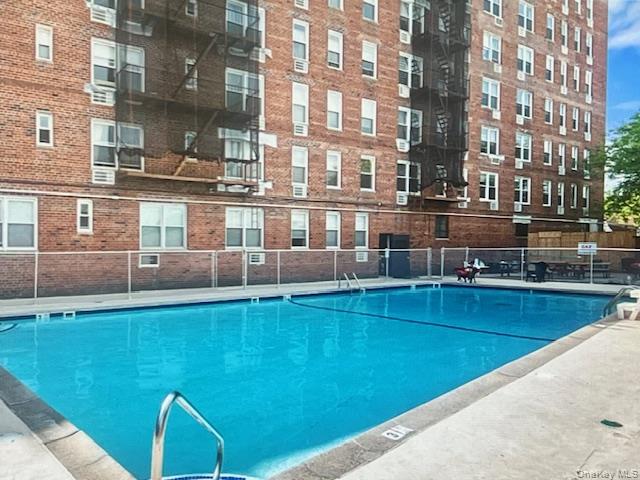 RARE L-SHAPE 1 BR CO-OP + DEEDED PARKING + POOL + TOP FLOOR PRIVACY W / PANORAMIC VIEWS ! * Oversized L-Shape 1 Br Co-Op w/ room to live , dine & WFH without compromise .* Plus the SUNNYSIDE UNICORN : Separate Deeded Parking Space in the enclosed building's garage . You Own it , no more alternate side . * Building amenities : In - ground swimming pool ; BBQ area with seating for sunset dinners . Private gardens exclusive to share holders . * Video/intercom security , laundry room, storage , bike rack & maintenance staff on site .* Location : 3 blocks to the 7 train at 46th St - Bliss ; 15 min to Midtown.- Steps to  Skillman Avenue , Sunnyside Gardens Park and all the Sunnyside best spots . WHAT MORE COULD YOU WANT ? HURRY !
