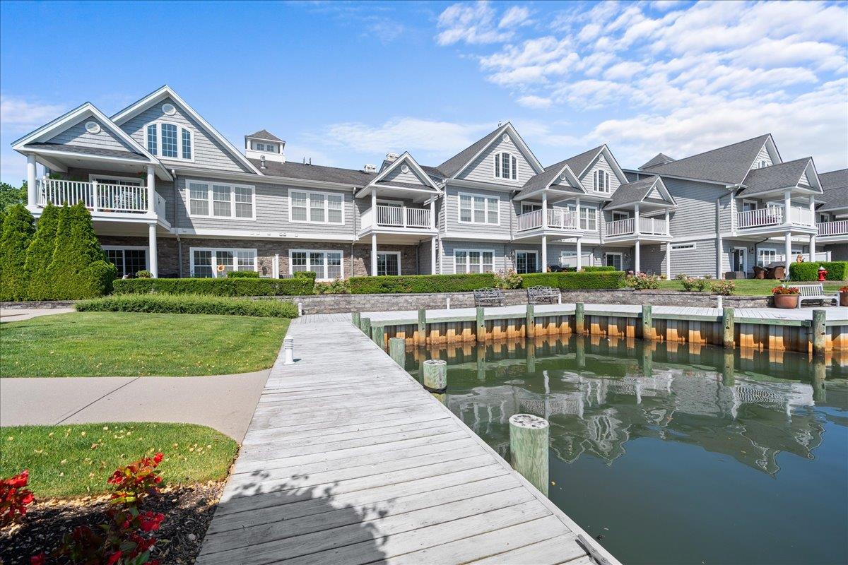 Welcome to pristine waterfront living in a highly desirable first-floor unit within a gated community surrounded by deep waterways. This beautifully maintained home offers an open kitchen with granite countertops, seamlessly flowing into an expansive living and dining area perfect for entertaining. Crown molding adds elegance throughout, while the primary ensuite features a full bath for your comfort as well as walk in closets.

The view from the patio showcases the expansive waterfront view with a unique sense of privacy and tranquility.  Step outside to enjoy the deeded boat slip, allowing you to embrace waterfront living to its fullest. The community offers magnificent grounds, a clubhouse, and an outdoor BBQ area, creating a lifestyle as beautiful as the setting.

This is a must-see opportunity for those seeking a waterfront lifestyle without compromise.