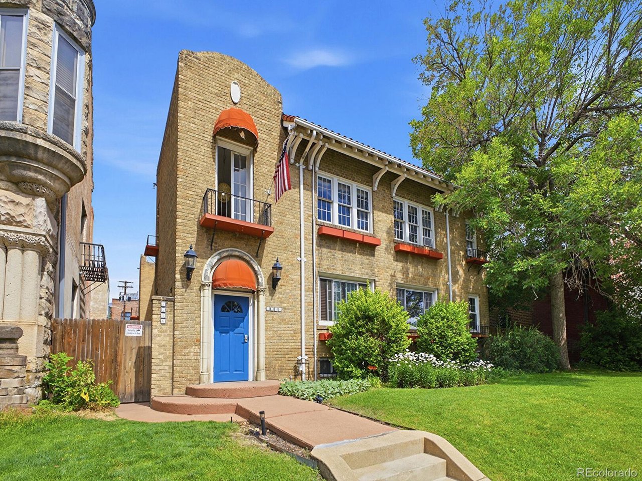 Experience the perfect blend of historic character and modern style in this one-of-a-kind Uptown condo, ideally situated in one of Denver's most walkable neighborhoods. Just steps from Restaurant Row on 17th Avenue, Colfax entertainment, local coffee shops, music venues, parks, and public transit, you'll love having the best of the city right outside your door.Inside, natural light fills the inviting living space, complemented by beautiful original hardwood floors that showcase the home's timeless charm. French doors lead to a versatile flex room that easily functions as a home office, guest bedroom, fitness space, or creative studio. The kitchen is super efficient and has plenty of storage for every day living.  Take the cool spiral staircase downstairs to the massive primary bedroom with its own entrance!This unique residence offers thoughtful features throughout, including three private entrances, an oversized bathroom, generous closet space with custom shelving, newer windows, and ceiling fans for year-round comfort.Step outside and discover a peaceful courtyard surrounded by mature landscaping, colorful flowers, and lush greenery-an ideal retreat for morning coffee, evening relaxation, or entertaining friends.Additional highlights include one reserved off-street parking space plus two city-issued residential street parking permits. Emerson Park Condos offers a true neighborhood feel with a friendly, self-managed HOA where owners take pride in maintaining the community through seasonal landscaping and annual cleanup events. HOA dues include heat, water, sewer, trash, exterior insurance, and grounds maintenance.If you're searching for a home with personality, community, and an unbeatable central Denver location, this Uptown gem is one you won't want to miss.