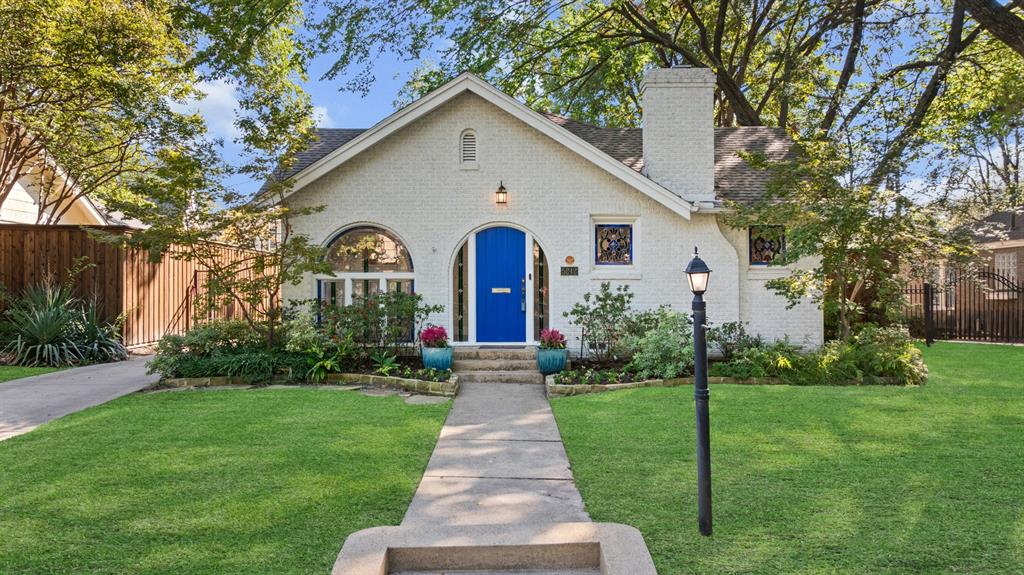 Nestled in the heart of the M Streets, this 1930s Tudor blends timeless character with modern updates and amenities. Surrounded by mature trees and historic charm, the home welcomes you with gleaming wood floors, leaded stained-glass windows, detailed trim work, and a beautiful fireplace that anchors the living room. Multiple living areas, including a bright sunroom, spacious living room, and formal dining room, create an inviting and versatile layout.The kitchen is completed with stainless steel appliances, granite countertops and flows into a cozy breakfast nook, while a full-sized laundry room adds convenience. The large primary suite is a true retreat with a soaking tub, separate shower, dual vanities, and an expansive walk-in closet. Enjoy outdoor living with lush landscaping and a spacious side deck off the dining room, perfect for a quiet coffee or entertaining, along with a wood fence with electric gate and a detached two-car garage. Ideally located, this jewel box is zoned to Mockingbird Elementary, within walking distance to the shops and dining of Lower Greenville, and minutes from Hwy 75 for easy access around the city.