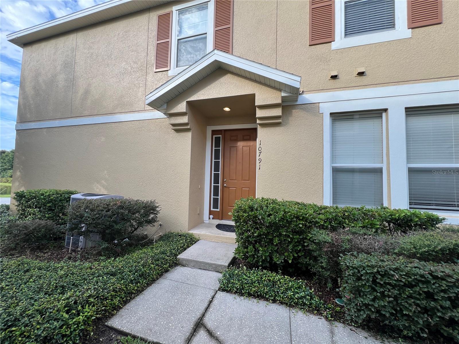 One of the most desirable communities in LAKE NONA is Villas at East Park. take this opportunity to own this beautiful and spacious 2/2 corner condo. The main door opens to laminated stairs that bring you to an open floor plan: living and dining room combo showcasing two sets of sliding doors that open to a Juliet balcony overlooking the pond. high ceilings and plenty of windows bring the sun inside, The fully equipped kitchen has plenty of storage, counter space and a generous pantry. This unit features a split bedroom floorplan, both bedrooms are generous in size and have views of the pond as well. Master bathroom has dual sinks, shower and tub combination with shower doors. Laundry room with dryer and and brand NEW washer. easy access to 417, 528 and Narcoossee Rd , within minutes you are in Medical City, Orlando International Airport, VA Hospital, Nemours Disney/Universal attractions and USTA. What I like about this property: High ceilings, views of the pond in the back from all rooms and social areas, spacious kitchen and kitchen storage. Property is currently leased. It is a great opportunity for an investor to already start capitalizing on their investment, property is easy to rent, because it is beautiful, functional and in an excellent community.
