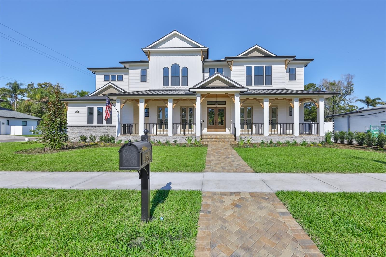 Under Construction. Welcome to 4123 W. Corona Street, a masterpiece of modern living nestled in the heart of South Tampa. Priced at $3,199,000, this exquisite new construction home combines sophistication and comfort, offering an unparalleled lifestyle in the coveted Mabry, Coleman, and Plant school district.As you approach, the home's southern manor charm greets you with elegant French doors and a welcoming covered porch. Step inside and feel the seamless flow of the expansive 5,162 sq ft interior. Sunlight pours through tall windows, illuminating the two-story foyer and inviting you to explore the open, airy spaces.Imagine entertaining in the spacious living areas, where artful touches and luxury finishes create an ambiance of warmth and elegance. The gourmet kitchen is a chef's dream, featuring upscale Fisher & Paykel appliances, double islands, and custom cabinetry. A hidden pantry prep room with a pass-through enhances the kitchen's functionality, while the open flow to the family room?complete with a double-sided gas fireplace?makes it an inviting space for gatherings. The first floor's flexible layout includes a sophisticated study, a dining room with a stunning glass-enclosed wine display, and a cabana room equipped with a full bath and space for a stackable washer/dryer. A mudroom completes the main level, ensuring every detail caters to your modern lifestyle.Ascend to the second level and discover the luxurious primary suite, a true retreat with sound-insulated walls, a spa-like bathroom featuring a soaking tub, and an expansive custom closet. Each of the additional three bedrooms offers its own custom bath and generous closet space, providing comfort and privacy for family and guests. The media room and second-floor laundry room, complete with a dog wash station, add convenience and functionality. Step outside to the breathtaking rear property, where a covered lanai with a stained wood tongue & groove ceiling overlooks the sparkling pool and spa. Imagine savoring your morning coffee here, or hosting barbecues in the summer kitchen as the quiet street hums with peaceful evenings. This home is equipped with top-of-the-line features, including an elevator, whole-home generator, impact windows, and a Moen Smart Leak Detection system. Enjoy peace of mind with in-wall pest tubes, an Elan Smart Home System, and a 2-10 Builder Warranty. With smooth drywall, interior 8ft doors, crown molding, a 25 Seer HVAC system with multi-zoned control, Icynene R-21 spray foam insulation, and speaker pre-wires, every aspect of this home is designed for luxury and efficiency. Imagine living in a home where every detail is crafted for your comfort and enjoyment. At 4123 W. Corona Street, you don't just purchase a home, you embrace a lifestyle. Come experience the harmony of elegance, innovation, and warmth that this exceptional property offers. Make it yours today.