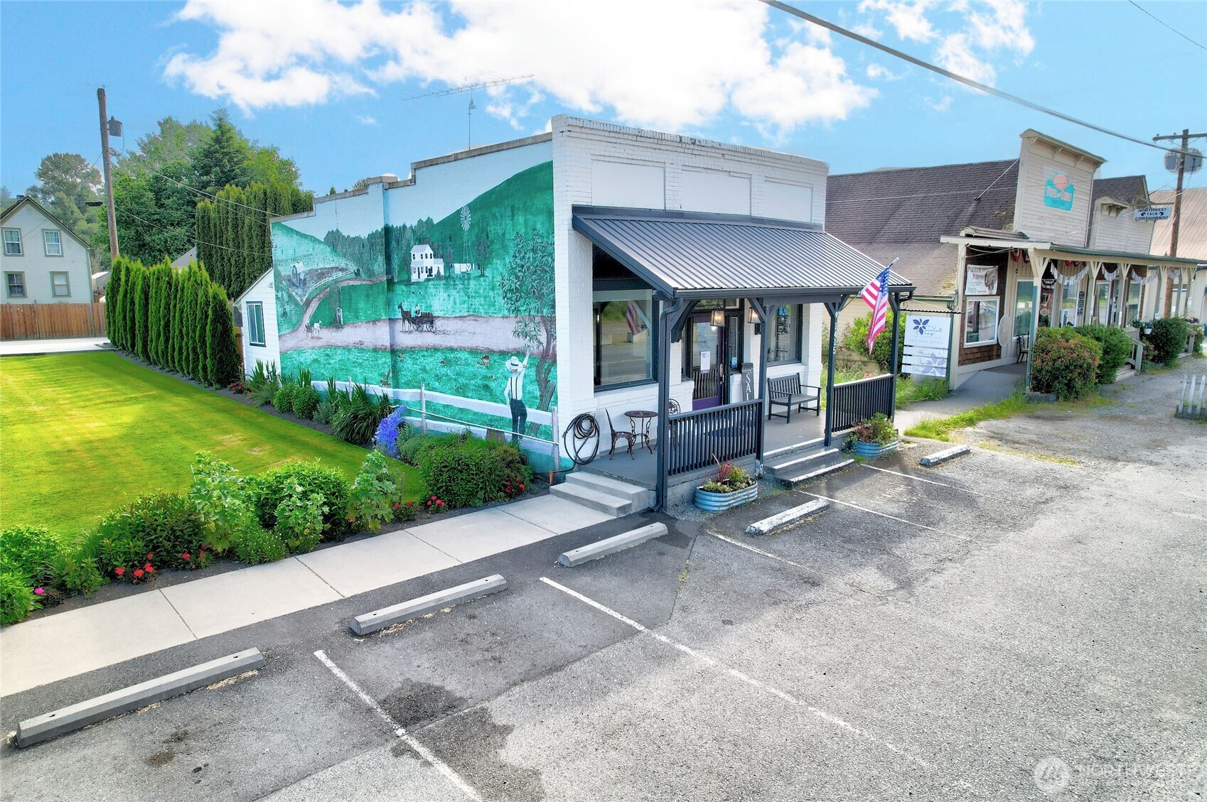 This fabulous renovated historic bank building is located in the quaint town of Silvana, just a few miles west of Interstate 5 on Hwy 530. This renovated bank building has been an ideal location for spa services for the past 18 years. Beautifully designed modern updates were made from ceiling to floor include flooring, lights, plumbing fixtures. This beautiful building is approximately 1200 asf. It is fully equipped with salon furniture/equipment (stylist chairs, wash stations, etc.) that can be purchased separately. The possibilities are endless – retail store, café, office space – use your imagination! Enjoy the Trex deck in the back for afternoon tea. Has a shed for extra storage. Own your piece of history with endless potential!