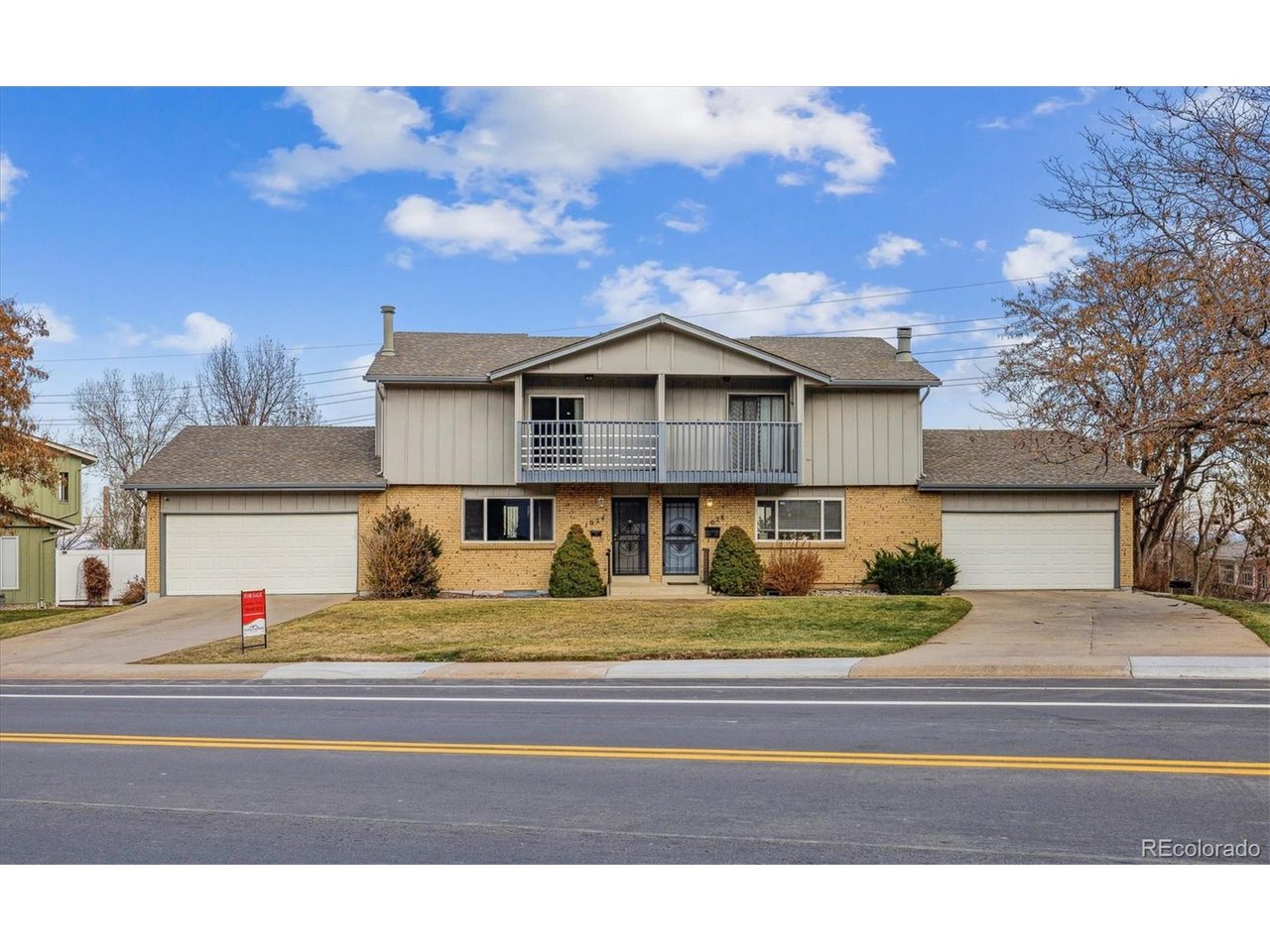 This updated townhome is in a very desirable location in west Lakewood! Beautiful hardwood throughout the entire main and upper floor was installed 2 years ago! Enjoy the large, light and bright kitchen with a beautiful backsplash,  great views to the east and a new treks deck just out the back door.  Stainless steel refrigerator is  years old, dishwasher and microwave are 3 year old!   Half bath is conveniently located between the kitchen and large living room.  The large dining area flows from the kitchen and has plenty of room for large gatherings and holiday meals! Upstairs you will find the primary bedroom with lots of space and a private primary bathroom, walk-in closet and it has it's own balcony!  There is a full bath in the hall located near the two additional bedrooms!  The basement has a huge family room and another bonus room that could be used as an additional bedroom, craft room or whatever you can imagine! The furnace and hot water heater are 1 year old and the HOA replaced the roof in 2020. Enjoy the luxury of walking just up the street to Green Mountain HIKING TRAILS, & the convenience of just a 15 min drive to Downtown Denver. The best of all worlds awaits with this centrally located, beautiful townhouse!