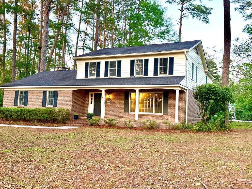 Welcome to what could be your Dream Home in Sherwood Forest, Thomasville, GA! Discover this hidden gem nestled in the highly sought-after Sherwood Forest neighborhood. Perfectly situated near Glen Arven Country Club and Archbold Hospital, this spacious 4-bedroom, 2.5-bath home offers comfort, convenience, and endless potential. Step inside to find beautiful hardwood floors—creating a warm and inviting atmosphere. The cozy wood-burning fireplace is perfect for relaxing evenings, while the versatile bonus room currently set up as a downstairs bedroom, offers endless possibilities for your lifestyle needs. Retreat to the expansive master suite, featuring a double walk-in closet with his and her sides, plus a charming sitting room for your private relaxation. Enjoy outdoor living with an approximately 20 x 40 concrete pool (new filter, cleaned and ready to swim in), complete with an adjoining covered changing area and half bath—ideal for entertaining family and friends. Bring your vision and make this house a true showplace once again. Don't miss your chance to own a piece of Sherwood Forest's charm!