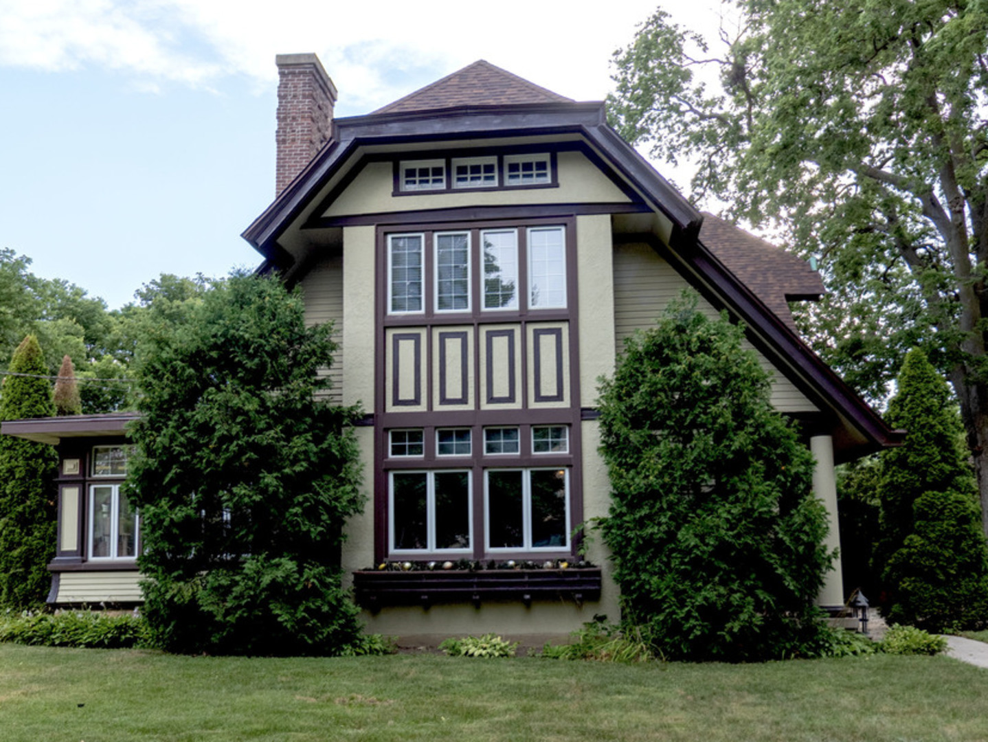 Welcome to the iconic "Grand Nettle Estate," a timeless treasure located just moments from downtown Morris.    Built in 1925, this stately residence offers approximately 3,954 square feet of living space, featuring 3 bedrooms and 4 bathrooms on an oversized lot. Upon entry, you're welcomed by a grand foyer and the enduring charm of original woodwork. The home boasts three fireplaces, one of which is in the main living area, the elegant sunroom, and the other is in the lower level adding flexible living or entertaining space. The expansive backyard is your private retreat-complete with an inground swimming pool, tennis courts, and a separate Coach House over garage ideal for guests or potential rental income. Major updates to the Coach House include new heating, air conditioning, and water heater in 2024, with plumbing improvements completed in 2022. Only cosmetic updates remain to make it your own. The main home features three HVAC systems, allowing for customized climate control throughout. Ample storage space ensures convenience, and the home's prime location offers walkability to local events and downtown attractions.    Come experience Morris-a place to visit for a day and stay for a lifetime.