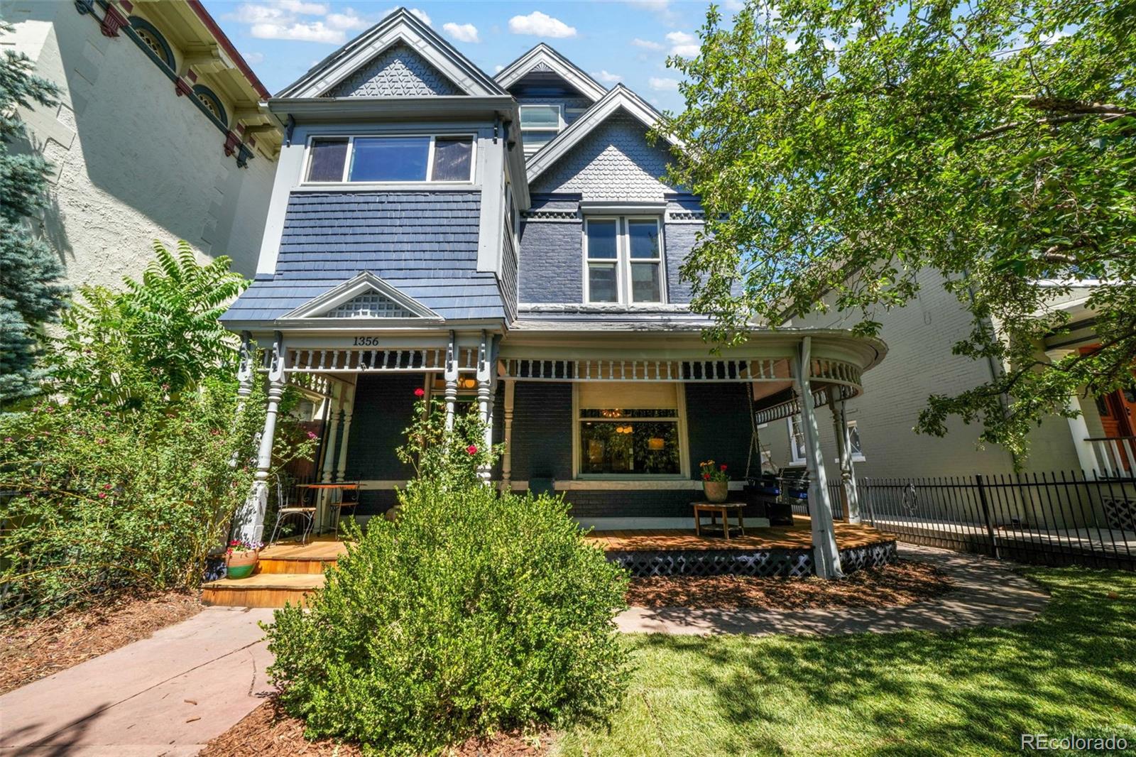 Gorgeously updated 4 bed, 5 bath Victorian home in the heart of Capital Hill & Cheeseman Park. Steps away from some of Denvers most beloved restaurants, coffee shops and bars, botanical gardens, parks, businesses and all the mile-high city has to offer! Well lived in and thoughtfully updated, including:  All Bathrooms updated and renovated in last 3 years, Plumbing upgraded throughout home, AC Unit replaced and upgraded in 2023, Mini Splits added in 2023, Hard Wood Floors restored on Lower Level and added on Second Level, Smart Lighting and Thermostats, Ducts repaired, Custom Cabinetry in Bathrooms and Laundry Room, Crown Molding Marble Floors and more! Furnace well maintained, cleaned and serviced every 6 months. Roof is currently being replaced and will be brand new prior to closing. Sewer Line was cleaned and certified June 2026. Sewer Scope & SPD available. State of the Art Appliances covered by 14-Month Home Warranty. 2-Car Garage built in 2020.  $10,000 Sellers Concession offered to Buyer for Interior Paint & Wallpaper Allowance upon Successful Closing.