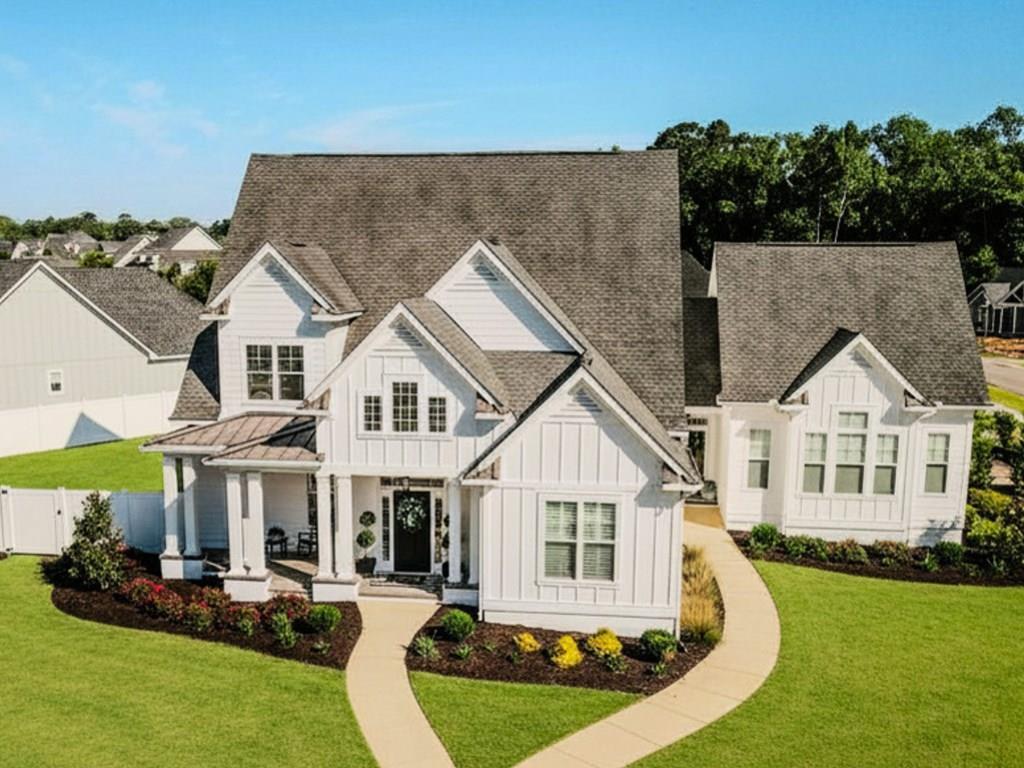 If you've been waiting for one of the finest homes in Madison Grove to become available, your search ends here. With over 4,000 square feet of beautifully designed living space, an oversized paver parking pad, and a completely separate second living area that can serve as a private apartment, guest suite, home office, studio, theater, or game room, this home offers a level of flexibility rarely found in today's market. Welcome to 343 Madison Grove Boulevard, where timeless design, exceptional functionality, and quality craftsmanship come together in one of Thomasville's most sought-after neighborhoods. From the moment you arrive, the curb appeal is undeniable. The expansive paver parking pad creates an impressive first impression while providing abundant parking for family and guests—a feature rarely found in Madison Grove. Inside, you'll find spacious living areas designed for both everyday comfort and effortless entertaining. Natural light fills the home, while the thoughtful floor plan provides the perfect balance of open gathering spaces and private retreats. One of this home's most distinctive features is the fully separate second living space. Whether you're accommodating extended family, creating a private guest suite, designing the ultimate media room, establishing a home business, or building the perfect hobby space, this flexible area adapts to your lifestyle today and for years to come. The generously sized bedrooms provide room for everyone, while the private primary suite offers a peaceful retreat with the space and comfort expected in a home of this caliber. Storage is another standout feature. From oversized closets to extensive attic storage, there's a place for everything, making organization effortless without sacrificing living space. Outside, you'll enjoy everything that makes Madison Grove one of Thomasville's premier communities. Sidewalk-lined streets, neighborhood amenities, and a welcoming atmosphere create the perfect setting for evening walks, bike rides, and connecting with neighbors. Homes offering this combination of size, versatility, storage, and location rarely become available. Whether you're looking for room to grow, space to entertain, or a home that can evolve with your family's changing needs, 343 Madison Grove Boulevard delivers. Seller is a Georgia licensed real estate agent. GARE Lic. #358323.