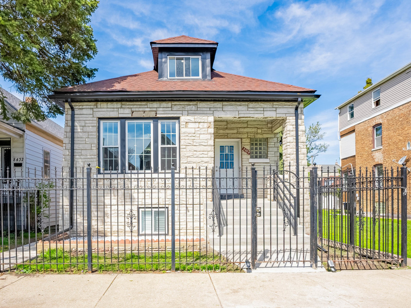 ALL NEW & MOVE-IN READY! This fully redesigned brick bungalow offers the perfect blend of modern style, space, and value across three beautifully finished levels. Enjoy peace of mind with a brand-new 2-car garage, new roof, new windows, new plumbing, new electrical, new furnace, new boiler, and new AC-everything has been updated for today's buyer! The open-concept main level welcomes you with hardwood floors, recessed lighting, a custom fireplace wall, and a stunning chef's kitchen with new custom navy cabinets, quartz countertops, stainless steel appliances, and a center island-ideal for entertaining. The second floor features a fully finished attic with a large family room, an extra bedroom, and a modern full bath-perfect as a guest suite or private retreat. The fully finished basement offers even more flexibility with three additional bedrooms, another full bath, a playroom, and durable ceramic floors-great for large families, multi-generational living, or working from home. MOTIVATED SELLER!