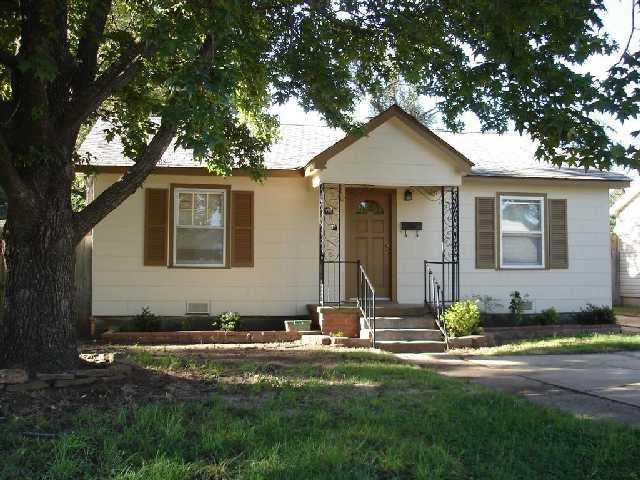 Located in the heart of Norman, just west of OU.  This quaint home is larger than some in surrounding area at 1340 sq. ft with 3 beds, 1 bath, 2 living areas, updated kitchen and bathroom.  It boasts original oak wood flooring in main areas and some carpet.  Updated kitchen and bathroom and perfect-sized fenced back yard.  There is additional concrete parking in front and a detached garage.  Interior laundry room with w/d hook-up and access to side driveway.  Come make this one your own!