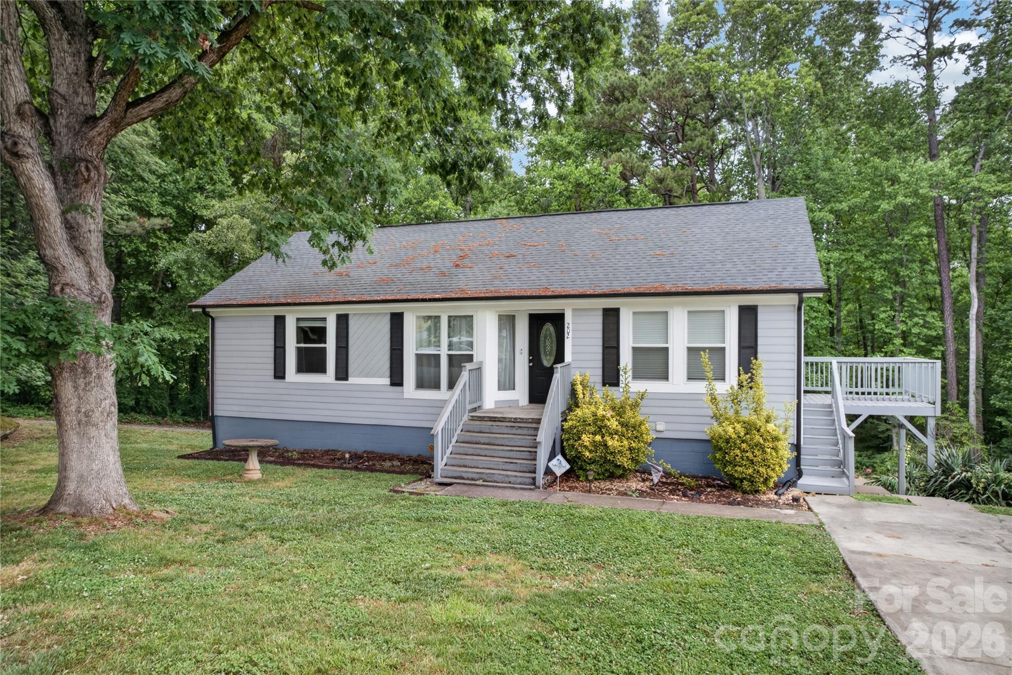 Great opportunity to own a walk-out basement home with plenty of space and potential on a quite street in the heart of Gastonia.This home features a functional layout with bright living areas with 3 bedrooms and 2 full bathrooms upstairs.The versatile basement with a bedroom plus full bath,and a bar is perfect for an additional living space,entertainment and/or storage.With few updates and personal touches this property could truly shine and make a wonderful place to call it home.