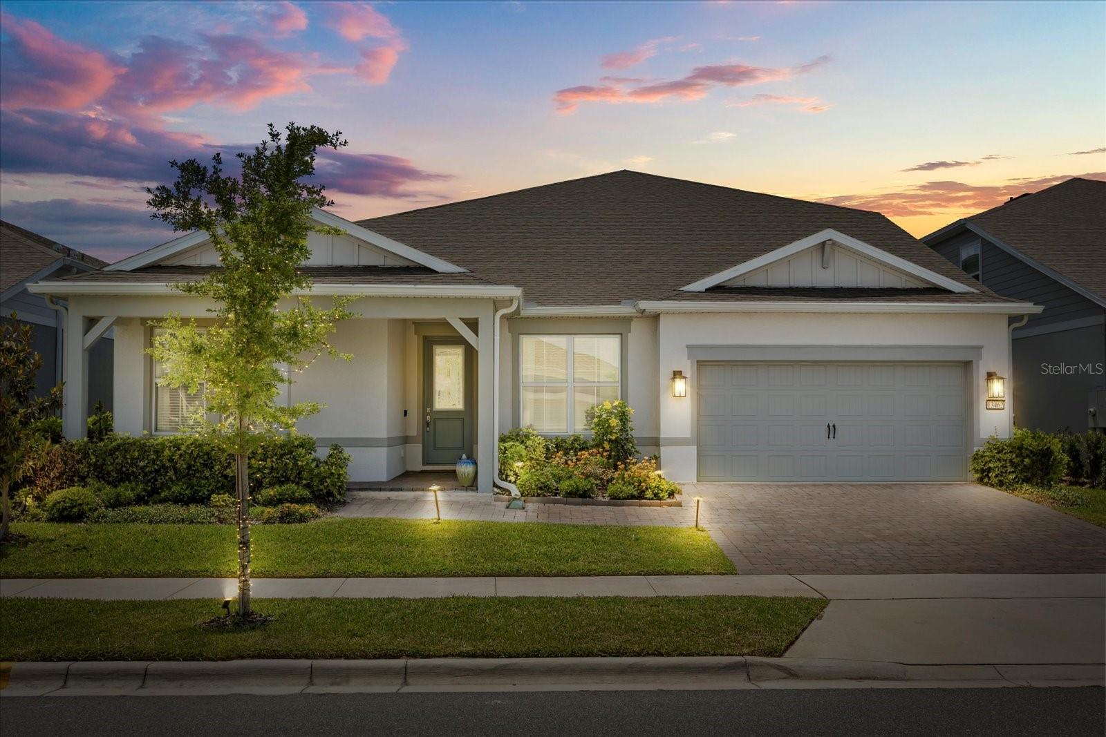 Welcome to one of the most unique residences available in Lake Nona. This exceptional EASLEY GRAND floorplan by Pulte spans 4,359 square feet of thoughtfully designed living space and is ideally positioned on a premium WATERFRONT homesite, on a cul-de-sac, facing NORTHEAST within the gated community of Isles of Lake Nona. From the moment you enter, you're welcomed by soaring ceilings and a luminous, open-concept layout adorned with elegant 22"x22" ceramic tile flooring throughout the main level. The home features four generously sized bedrooms, plus a dedicated home office, and a formal dining room that’s ideal for hosting gatherings with sophistication and ease. The gourmet kitchen is a showpiece, offering GRANITE countertops, SOFT CLOSE CABINETRY, STAINLESS STEEL APPLIANCES, including a NATURAL GAS RANGE—all designed to inspire culinary excellence while framing breathtaking LAKE views from the adjoining family room. Retreat to the oversized primary suite, where tranquil WATER VIEWS set the tone for relaxation. The ensuite primary bath offers double vanities with GRANITE countertops, a walk-in shower, and a massive custom walk-in closet. All full bathrooms in the home feature double sinks, ensuring comfort and functionality throughout. The three guest bedrooms on the first floor are generously proportioned, offering exceptional comfort and flexibility. The third suite enjoys the privacy of its own en-suite bathroom, making it ideal for a mother-in-law retreat or a luxurious guest quarters.
Step outside to your personal slice of paradise: an OVERSIZED COVERED LANAI with pavers, a FULLY EQUIPPED SUMMER KITCHEN with a NATURAL GAS GRILL and sink, and uninterrupted vistas of the serene lake—perfect for al fresco dining and entertaining year-round. The second floor is an entertainer’s dream, featuring an expansive LOFT, a dedicated THEATER ROOM with SURROUND SOUND, and two additional bedrooms with a full bath with double sinks—ideal for guests or multigenerational living. Additional upgrades include an EPOXY-coated two-car garage complete with a TESLA charger. Residents of Isles of Lake Nona enjoy access to world-class amenities, including a resort-style pool, splash pad, fitness center, clubhouse, and playground. Lawn maintenance and internet are included in the HOA for a truly effortless lifestyle.
Zoned for top-rated schools and just minutes from the 417, Lake Nona Town Center, the Wave Hotel, Boxi Park, Orlando International Airport, the USTA, and the VA Medical Center—this home embodies the very best of luxury and location.