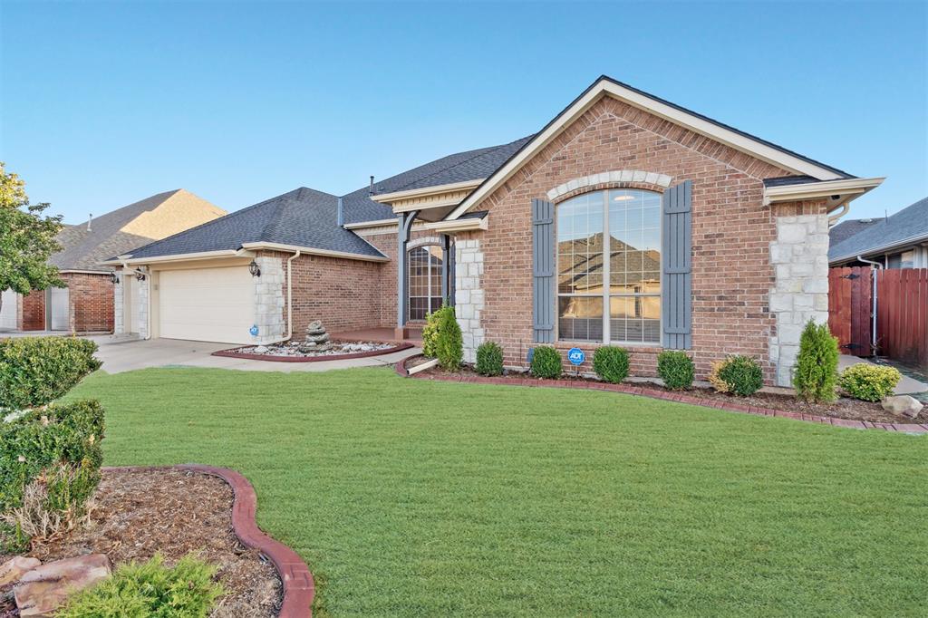 Beautifully updated 3,360 SF home in a prime OKC location within the Piedmont School District! Nicely groomed landscaping and spacious front porch create an inviting first impression. Inside the functional floor plan features 4 full bedrooms, 3 full bathrooms, 2 dining areas, 2 living areas, a dedicated study, a junior office, and a media room! The foyer opens to a roomy office and a formal dining room featuring high ceilings and crown molding. Tile flooring leads to the formal living room framed by dark wood pillars, which flows seamlessly into a generous great room. This open space includes a breakfast nook, a sizable living area, and a huge kitchen ideal for everyday living and entertaining. The kitchen offers abundant storage with ceiling-height cabinetry, a pantry, and an island with built-in oven, microwave, and stovetop. A natural brick feature wall adds warmth and character. Just off the kitchen is a perfectly placed junior office with multiple uses. The living room provides flexibility for a variety of furniture arrangements and is anchored by a gas fireplace with granite tile surround. The primary bedroom is a true retreat with hardwood floors and a tray ceiling that adds height and elegance. The ensuite features a dual-sink vanity, glass-enclosed shower, jetted tub, and a walk-in closet with built-ins. On the opposite side of the home, one bedroom has access to its own hall bath, while two additional bedrooms share a Jack-and-Jill bath with dual sinks, a private vanity area, and a tub/shower combo. Completing the interior are an impressive media room easily set up as a private theatre, along with a functional laundry room offering built-in shelving and hamper areas. Outside, the redesigned back porch offers exceptional outdoor living space, and a handy shed makes tool and equipment storage a breeze. This home truly has it all, including a one-year-old roof, new AC unit, new water heater, fresh paint throughout and a 1 year home warranty!