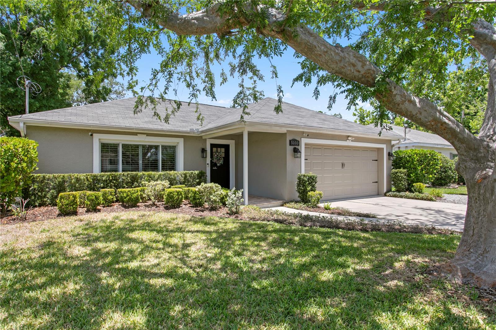 Welcome home to your completely updated, meticulously maintained and turn key, ALL BLOCK one story home in the heart of it all. This home NEVER flooded during EITHER storm and sits high and dry, and located in BEACH PARK  one of the BEST neighborhoods in South Tampa. Whether you want to go walk on Bayshore Boulevard, grab dinner in downtown Tampa, take a drive to the beaches, or run to the many grocery stores minutes away, this location is it. This three bedroom, two bathroom home with a large two car garage with storage and over 1,600 square ft, this home truly has the best floor plan and has so many upgrades throughout with many built in features. This home has timeless and thoughtful updates throughout including beautiful tile adorning the floors throughout with luxury vinyl in the bedrooms, newly renovated bathrooms, custom built pantry storage in the kitchen, Newer paint, newer plumbing faucets, cabinet hardware, and lighting fixtures throughout, newer stainless steel appliances (refrigerator with special ice feature, microwave, range/oven with air fry option, beverage fridge) are all under 3 years old, and can be controlled via app to make life easier. As you step inside, natural light pours in all directions, and this floor plan has so many options with its current function to be two different spaces between when you walk into the living room and kitchen, separated by drywall which can be easily removed if someone would want to make it more of an open concept living space for larger entertainment options. All three bedrooms and bathrooms are located in the back of the home with so much privacy and all include custom closets in each of the rooms. As you step outside, you'll find your private covered porch which overlooks a massive backyard which is fully fenced perfect for entertaining. Located in A+ School district, minutes from Tampa International Airport, quick access to I275, I-4, and Veterans Expressway. *one photo or more photo staging
