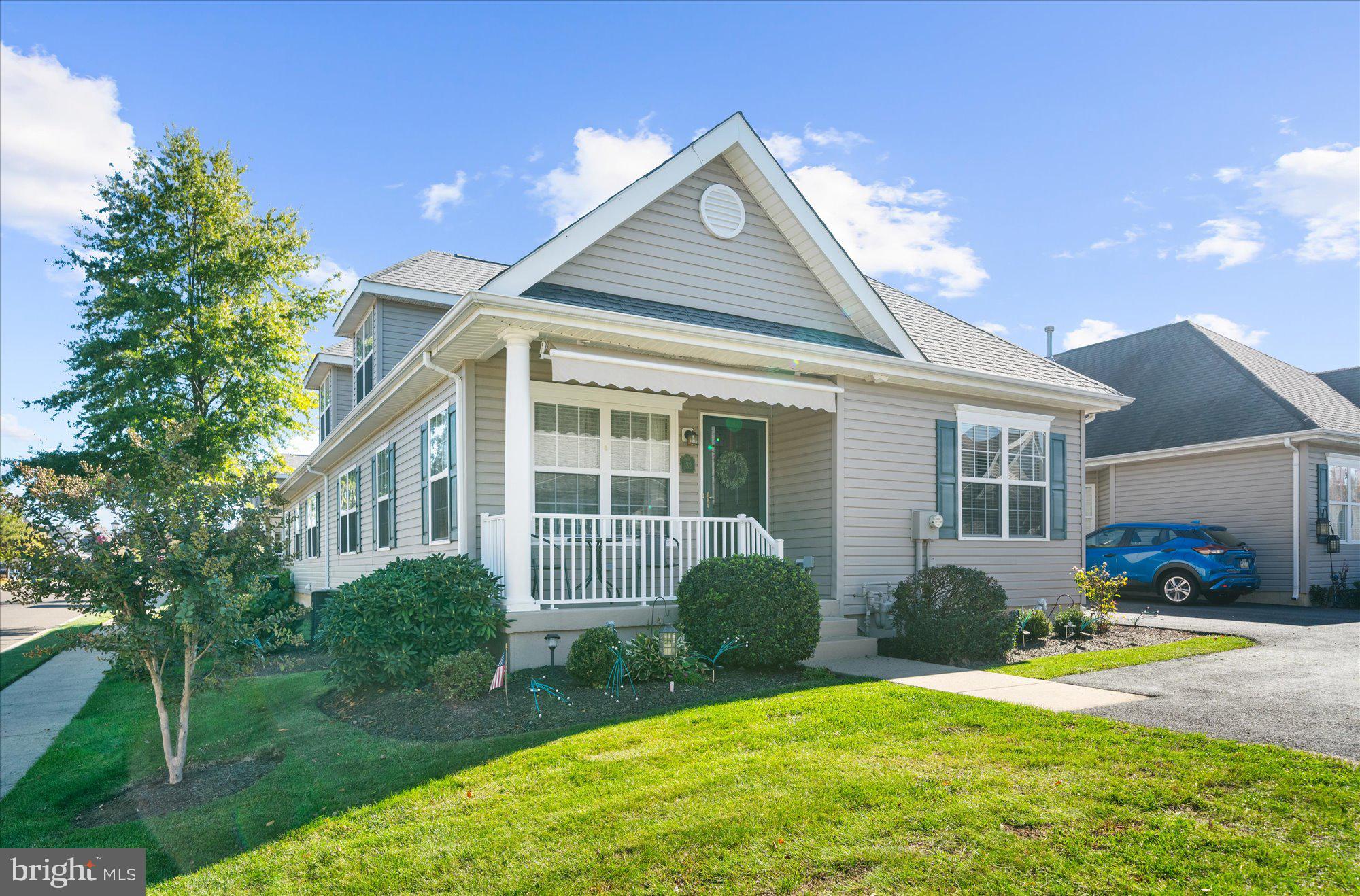 Welcome to 182 Harmony Court, ideally located in the highly sought-after 55+ community of Chancellor's Glen. This beautifully maintained home offers the ease of one-floor living with the added bonus of a spacious loft, private bedroom, and full bath upstairs, making it perfect for guests or extended family.As you approach the home, you'll be greeted by a charming front porch, complete with a retractable awning, creating the perfect spot to relax, unwind, and enjoy the neighborhood atmosphere throughout the day.Step inside to a bright and inviting living room featuring dramatic cathedral ceilings and an open, airy feel. The adjoining dining room is ideal for family gatherings and entertaining, while the kitchen offers ample workspace and includes a refrigerator and dishwasher. A convenient powder room is also located on the main level.The expansive primary suite is privately situated off the living room and features a large walk-in closet and an en-suite bath with a soaking tub, stall shower, and linen closet.Upstairs, the versatile loft provides endless possibilities as a home office, sitting room, hobby area, or reading retreat. Adjacent to the loft is a spacious bedroom with a full bath, creating an ideal guest suite.An exceptional bonus is the beautifully finished basement, offering abundant space for entertaining, recreation, or simply enjoying a quiet retreat. This level also provides extensive storage space.Throughout the home, you'll appreciate the thoughtful details, including hardwood floors, chair rail molding, and elegant wainscoting.Enjoy a truly low-maintenance lifestyle with lawn care, snow removal, and trash service included. Residents of Chancellor's Glen have access to an outstanding clubhouse featuring an indoor pool, fitness center, event and meeting room, and library/game room. The association fee also covers common area maintenance, much of the exterior maintenance, professional management, and more.Chancellor's Glen is a vibrant, beautifully maintained community that truly defines the meaning of loving where you live. Don't miss the opportunity to make this exceptional home your own!