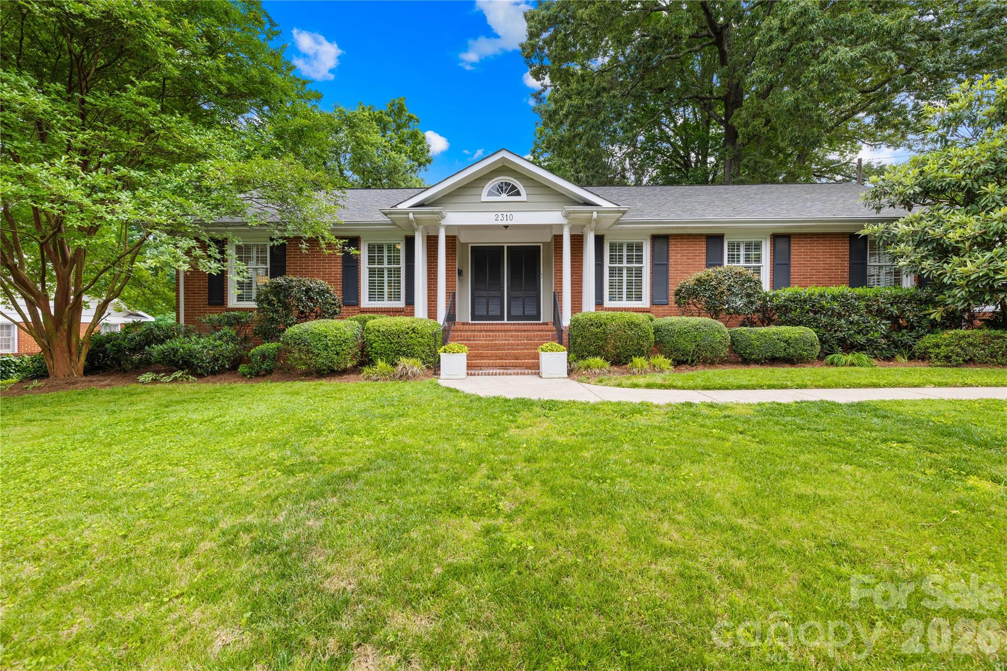 Welcome to this beautiful one-story home nestled in Charlotte’s highly desirable Montclaire neighborhood. This 3-bedroom, 2-bath residence offers the perfect blend of comfort, character, and convenience with a functional layout designed for easy everyday living. Hardwood floors flow throughout the home, adding warmth and timeless character to every room. The updated kitchen features modern finishes, ample cabinetry, and a functional workspace perfect for cooking and gathering. The primary suite features an updated bath complete with luxurious heated floors for a spa-like retreat. Filled with natural light and classic ranch-style charm, this home is ideal for both relaxing and entertaining. Enjoy a private backyard with mature trees and plenty of space to unwind or host guests. Conveniently located just minutes from SouthPark, Uptown Charlotte, the light rail, greenways, shopping, and dining, this home offers unbeatable access to everything Charlotte has to offer while maintaining the charm of an established neighborhood.