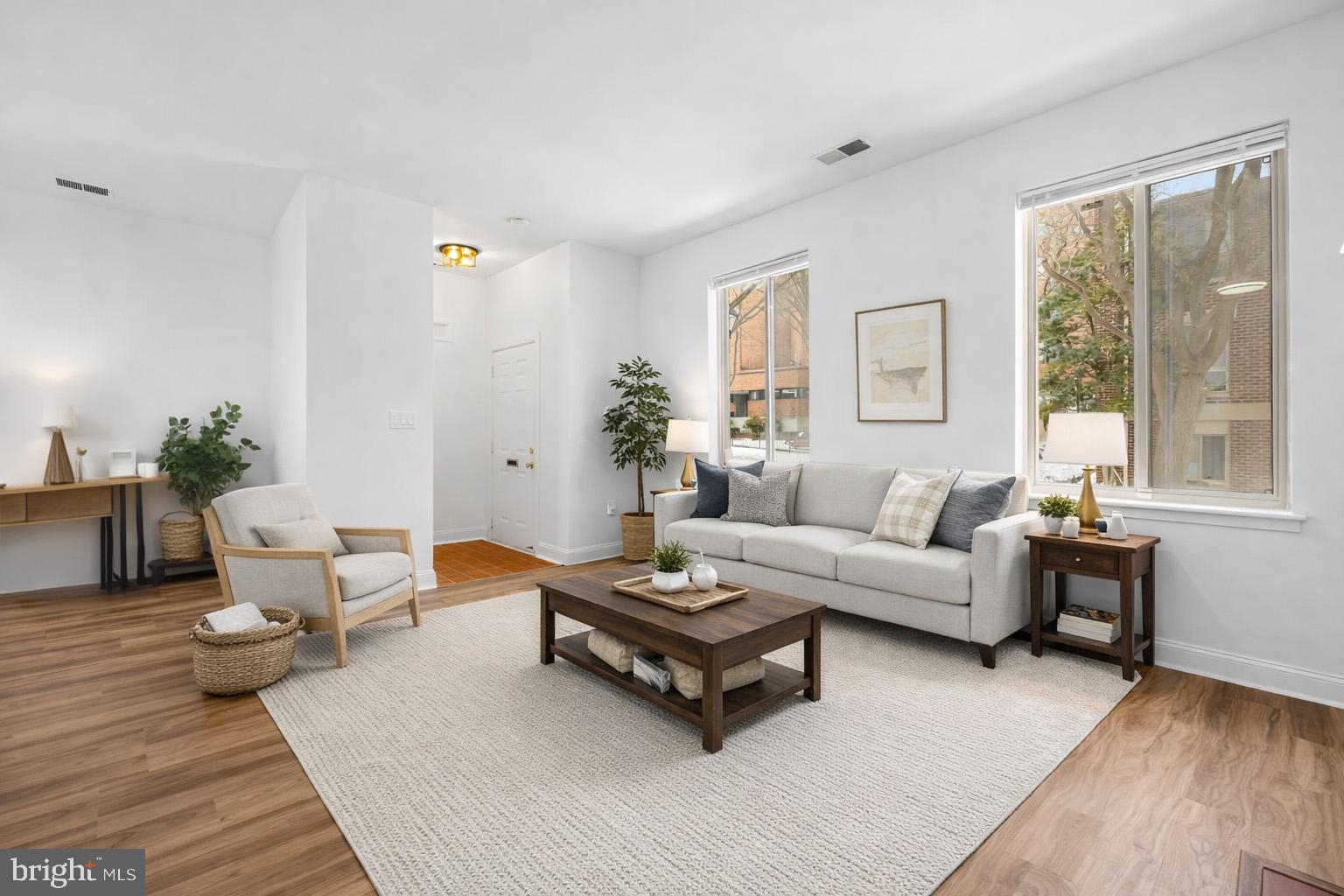 Located in the heart of Otterbein, one of Baltimore’s most centrally located and sought-after neighborhoods, this beautifully updated 2-bedroom, 2-full-bath contemporary townhome offers the perfect balance of city convenience and residential comfort. High ceilings, an open floor plan, and new flooring throughout create a bright, cohesive, and inviting living space.The kitchen has been tastefully renovated with granite countertops, updated cabinetry, and modern appliances, including a new refrigerator, while a new washer and dryer add everyday ease. Both full bathrooms have been renovated, blending timeless finishes with modern functionality. The spacious primary bedroom features large closets and a private ensuite bath, providing a comfortable retreat.The front door opens to a peaceful courtyard setting with no drive-through traffic, a rare feature in such a central location. One off-street parking space is included in a secured lot.Otterbein is known for its historic charm and close proximity to Baltimore’s urban core, with easy access to Camden Yards, M&T Bank Stadium, the Inner Harbor, Light Rail, MARC Train, museums, restaurants, and shopping.The rental is subject to all HOA Rules & Regulations. Applicants must be 18 years or older with a minimum credit score of 700 and documented monthly income of at least three times the rent.