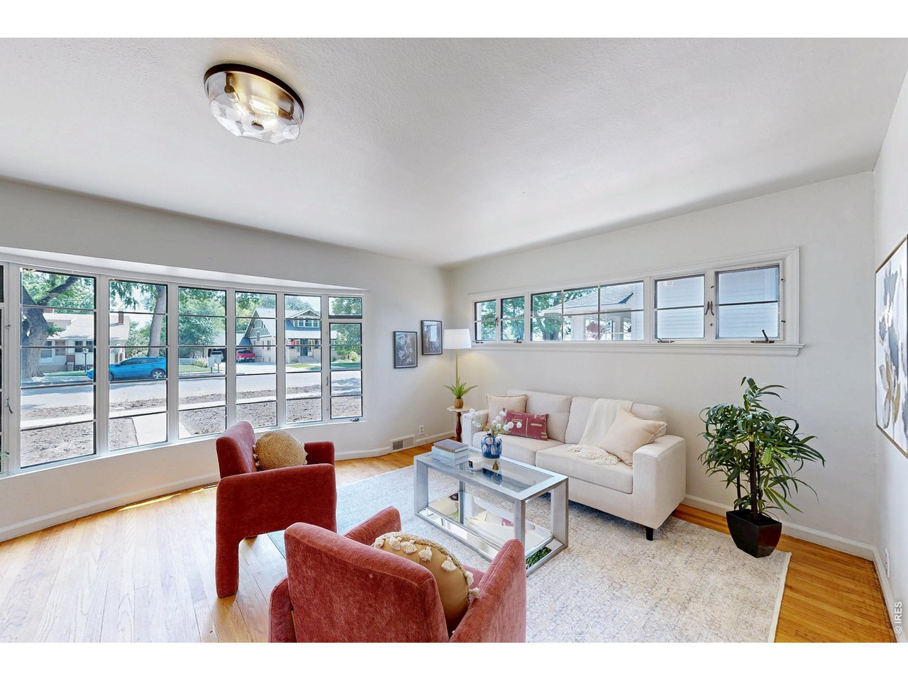 Character, charm and possibilities come together in this classic Eaton home. This 2-bedroom, 1-bath home offers over 1,700 sq. ft. and architectural details you simply don't find in today's new construction. Outside, an established setting surrounds the 7,000 sq. ft. lot, while the 576 sq. ft. 2-car garage provides exceptional room for oversized vehicles, a workshop, toys and storage. Rear alley access provides added convenience. Step inside, where beautiful hardwood flooring, natural light and original details create a warm and inviting interior. Arched openings lead to the distinctive dining room, where a curved glass-block wall and built-in niches create a space full of personality. The bright kitchen offers abundant cabinetry and counter space, stainless steel appliances and convenient main-level laundry. Both bedrooms are generously sized and feature deep closets, offering more storage than you might expect in a home of this era. The 456 sq. ft. basement provides valuable additional space for storage, hobbies, a home gym or other creative uses. Roof, furnace, A/C and water heater were all replaced in 2019, along with the recent sprinkler system repair. Enjoy the charm of small-town Eaton with convenient access to local shops, restaurants, parks, recreation, schools and nearby Greeley, Windsor and surrounding Northern Colorado communities. Come see why 10 Park Avenue just might feel like home.